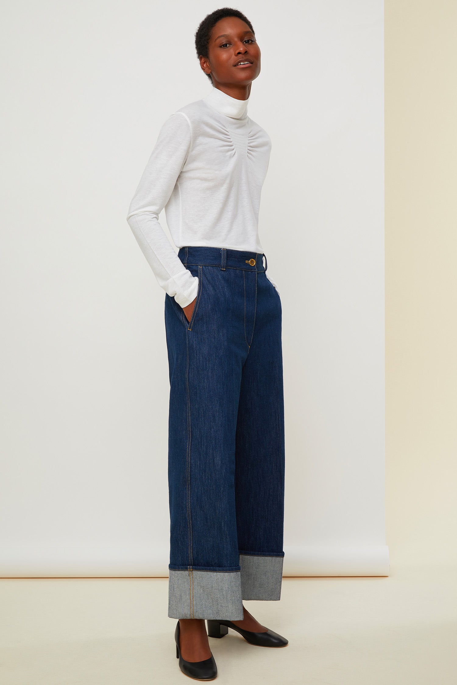 Patou - High neck jersey top - White - The high neck raises the stakes. White wool jersey long-sleeve top. High collar and smocked detailing at the front. Gold-coloured logo at the back.