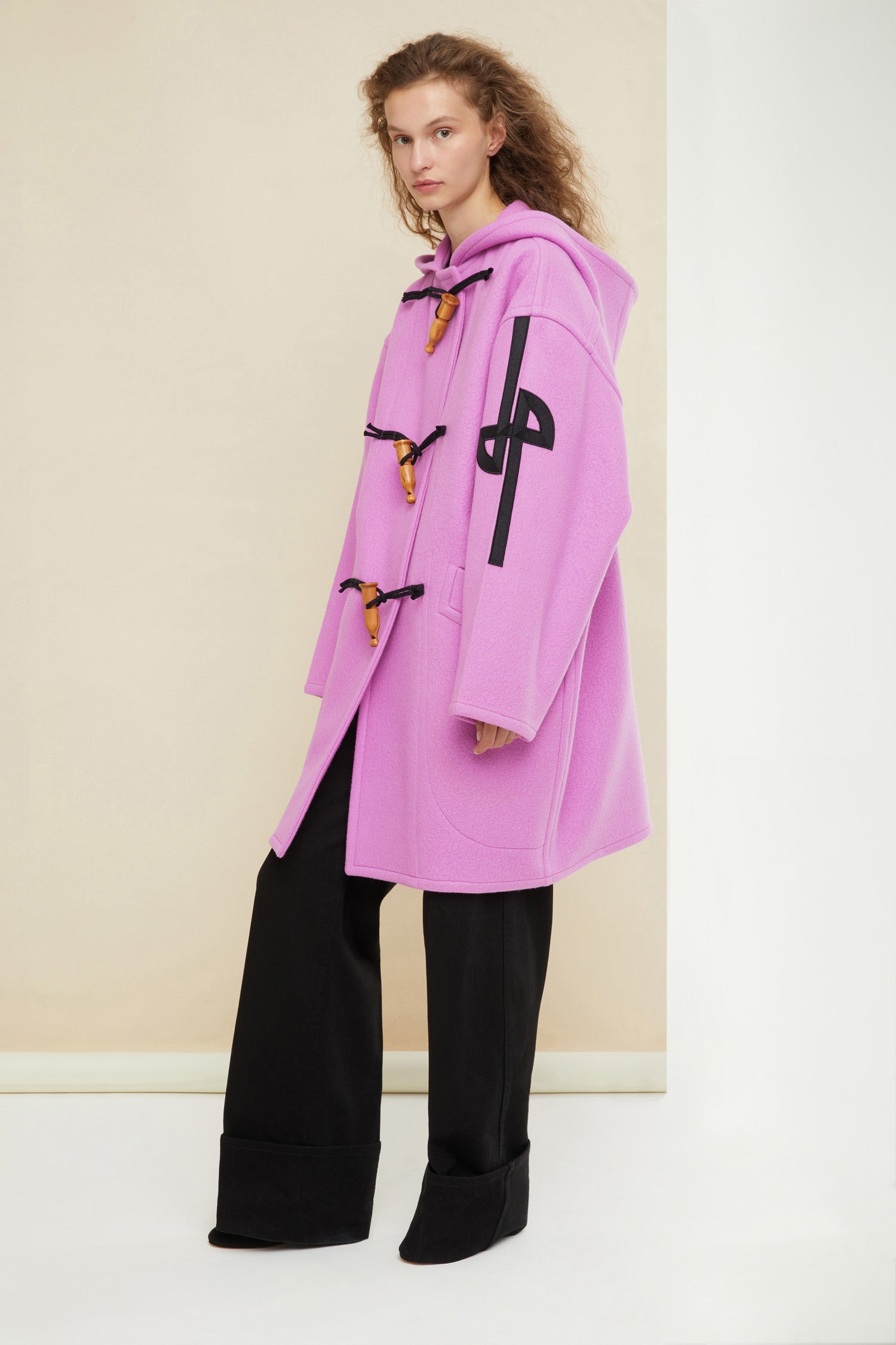 Patou - Cashmere and wool blend duffle coat - Raspberry - Wool and whistles.Raspberry pink cashmere and wool duffle coat. Crafted from recycled materials blended to achieve a softly worn look over time. Oversized silhouette. Hooded collar. Fastens via wooden buttons shaped like bird calls as well as concealed press buttons. Stylised JP logo embroidered in black on the left sleeve. Oversized patch pockets.