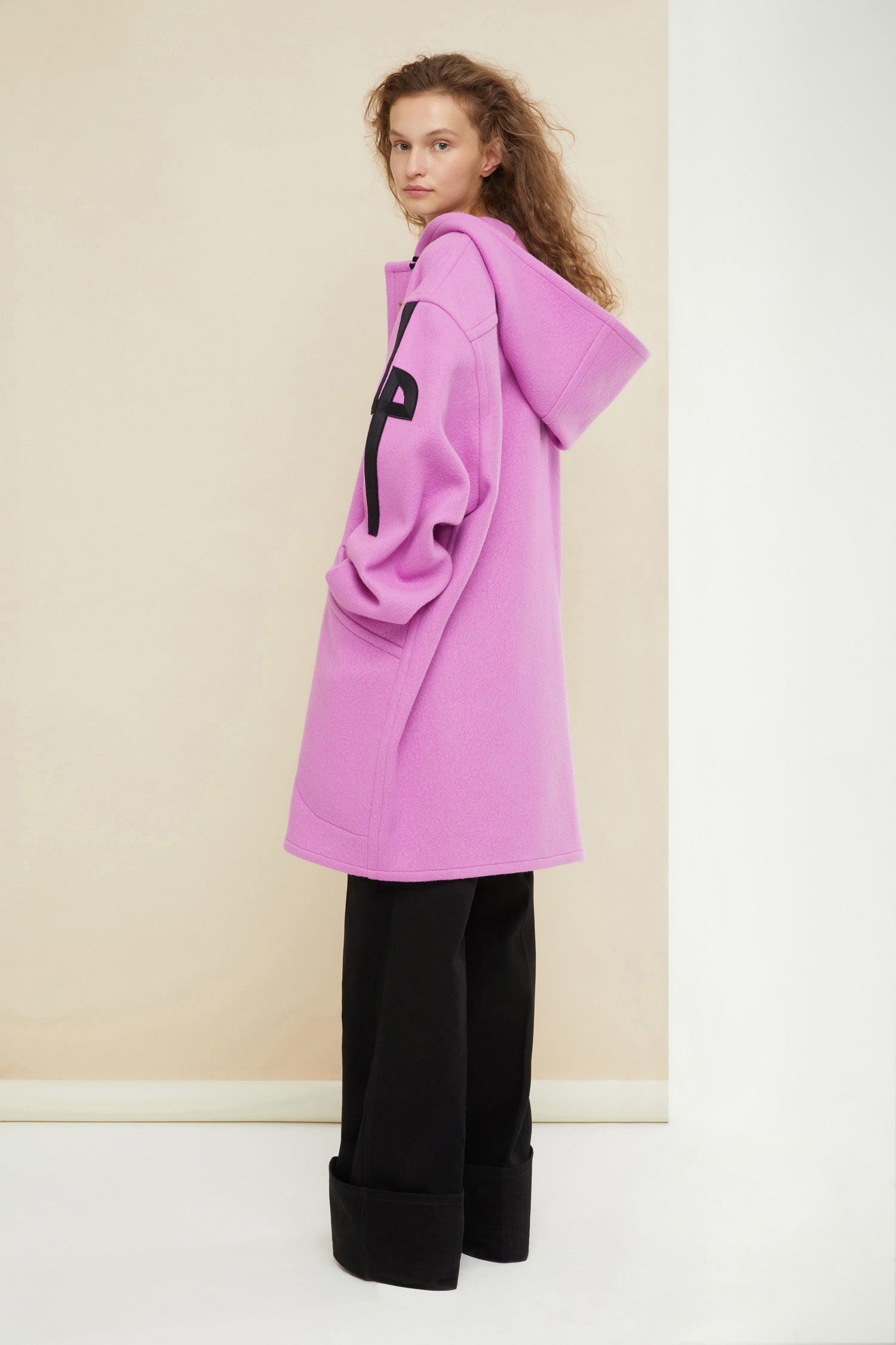 Patou - Cashmere and wool blend duffle coat - Raspberry - Wool and whistles.Raspberry pink cashmere and wool duffle coat. Crafted from recycled materials blended to achieve a softly worn look over time. Oversized silhouette. Hooded collar. Fastens via wooden buttons shaped like bird calls as well as concealed press buttons. Stylised JP logo embroidered in black on the left sleeve. Oversized patch pockets.