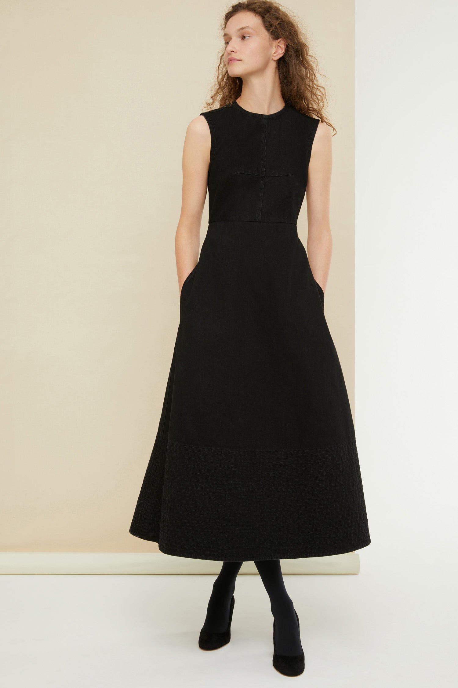 Patou - Midi dress in organic denim - Black - Denim fit for a gala? Perfectly Patou.Black organic denim dress. A-line silhouette that is fitted at the bust and waist. Sleeveless style. Zip fastening at the back. Darts across the bodice. Midi length with topstitched detailing across the bottom.