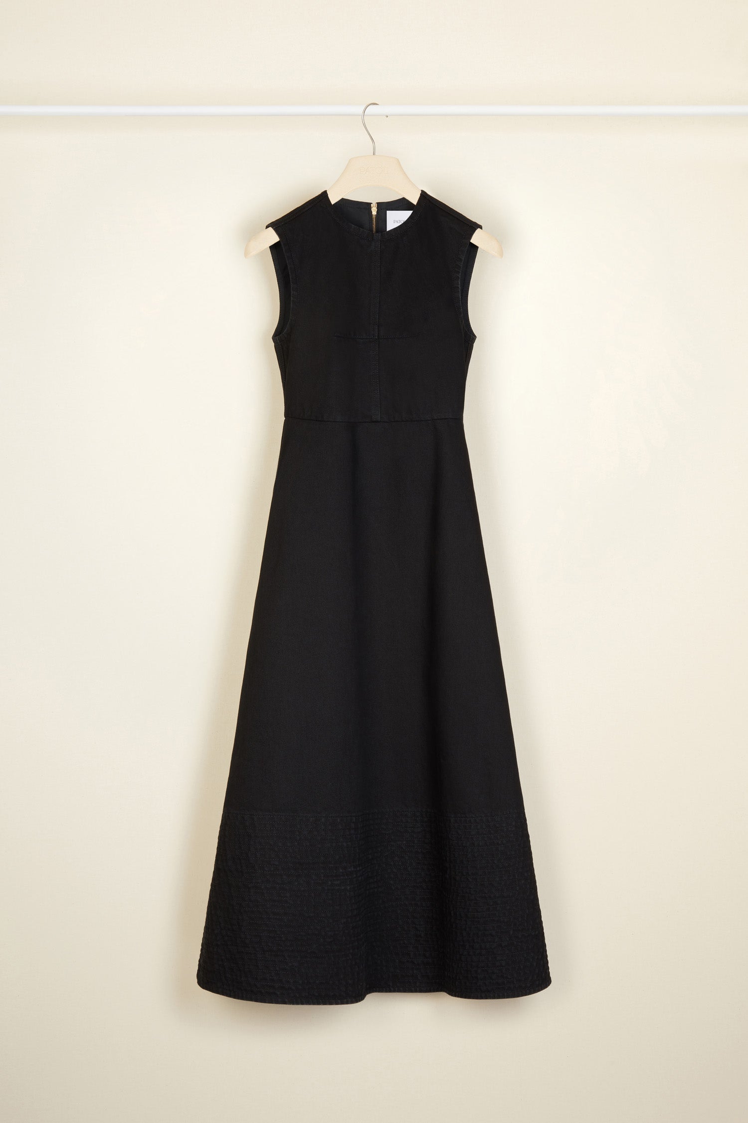 Patou - Midi dress in organic denim - Black - Denim fit for a gala? Perfectly Patou.Black organic denim dress. A-line silhouette that is fitted at the bust and waist. Sleeveless style. Zip fastening at the back. Darts across the bodice. Midi length with topstitched detailing across the bottom.