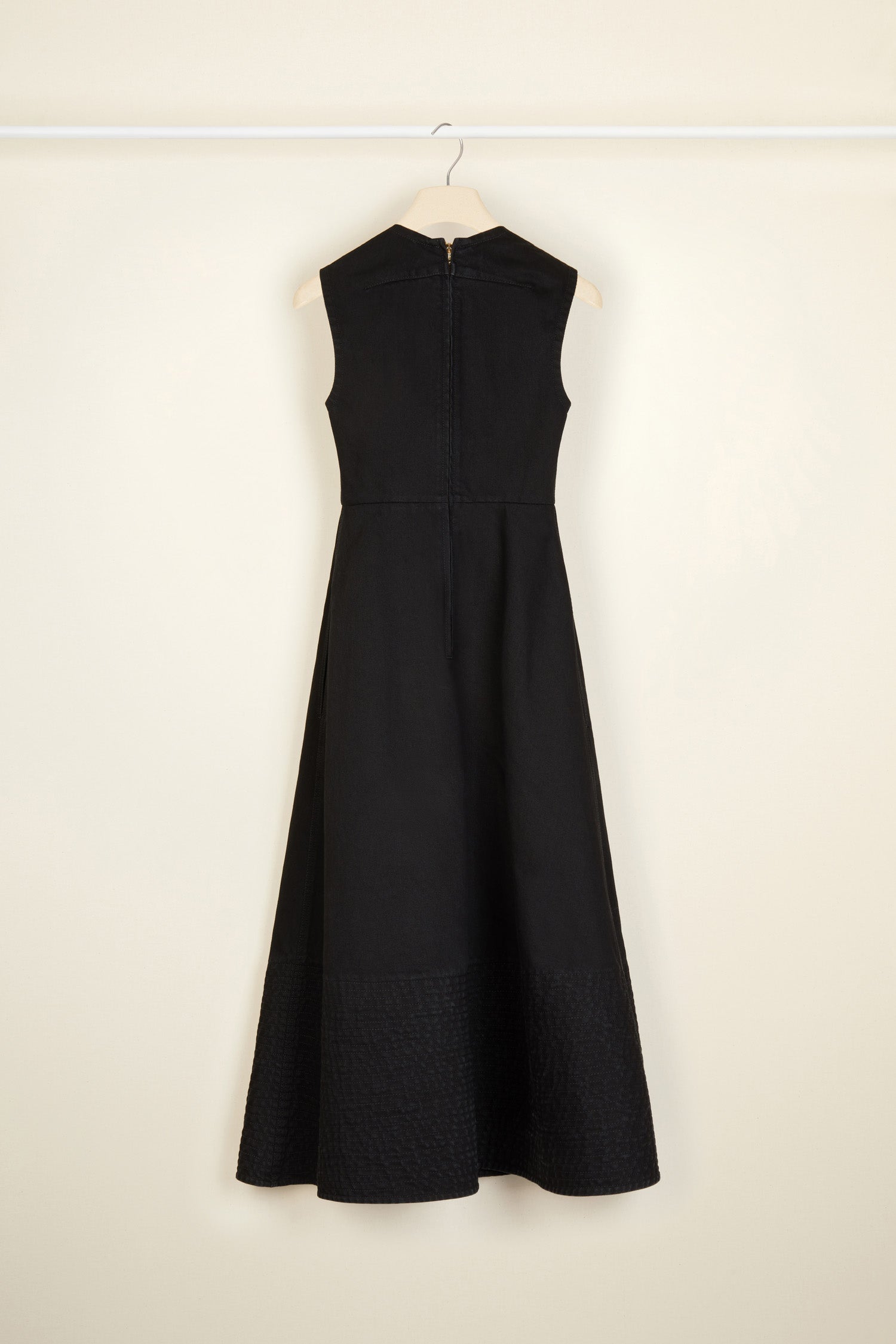 Patou - Midi dress in organic denim - Black - Denim fit for a gala? Perfectly Patou.Black organic denim dress. A-line silhouette that is fitted at the bust and waist. Sleeveless style. Zip fastening at the back. Darts across the bodice. Midi length with topstitched detailing across the bottom.
