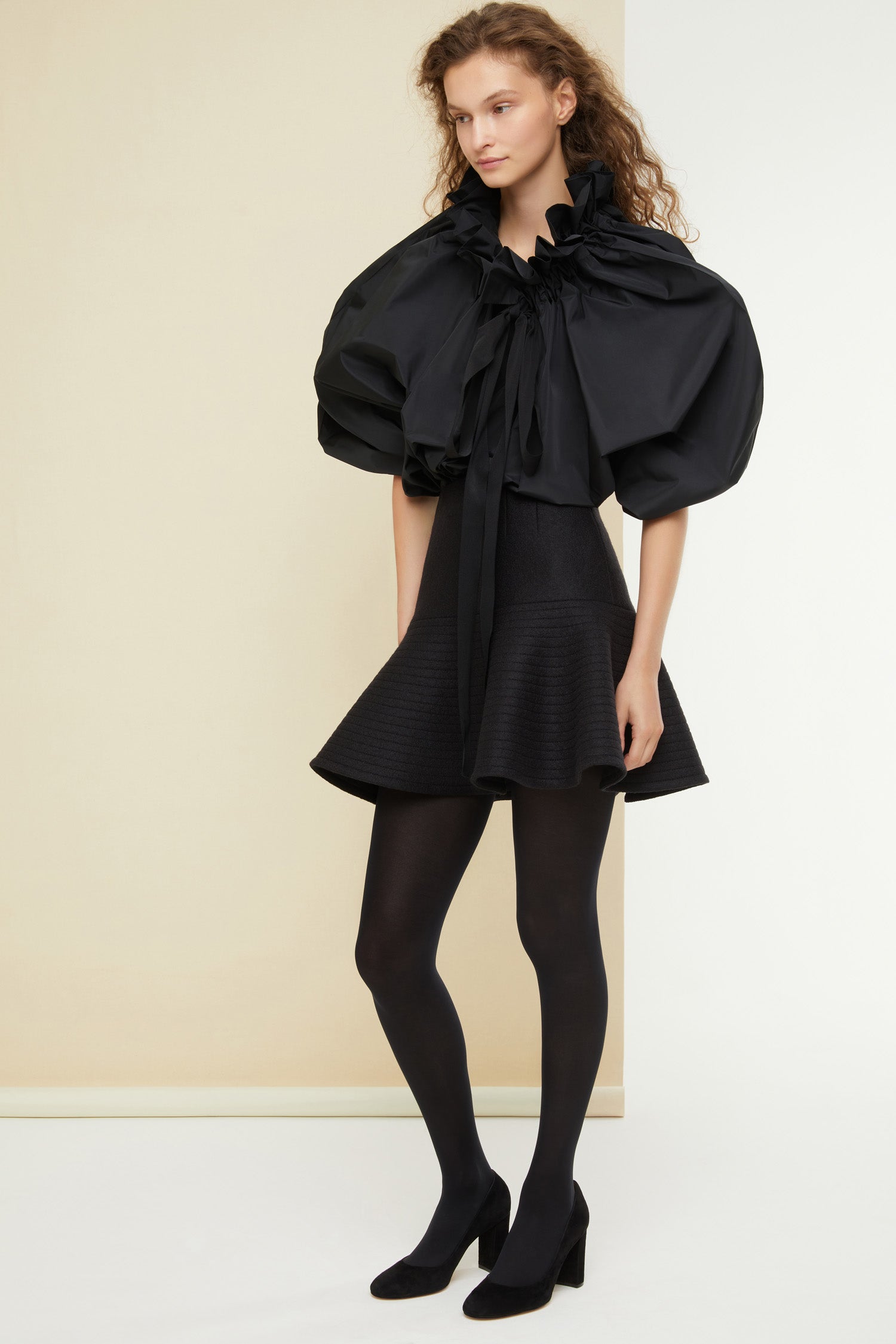 Patou - 3D mini skirt - Black - Oui, oui, oui: three cheers for the 3D mini!Black boiled wool 3D mini skirt. Godet silhouette. Topstitching all over to create a voluminous wavy effect. Darts at the front and back. Zip fastening at the back.