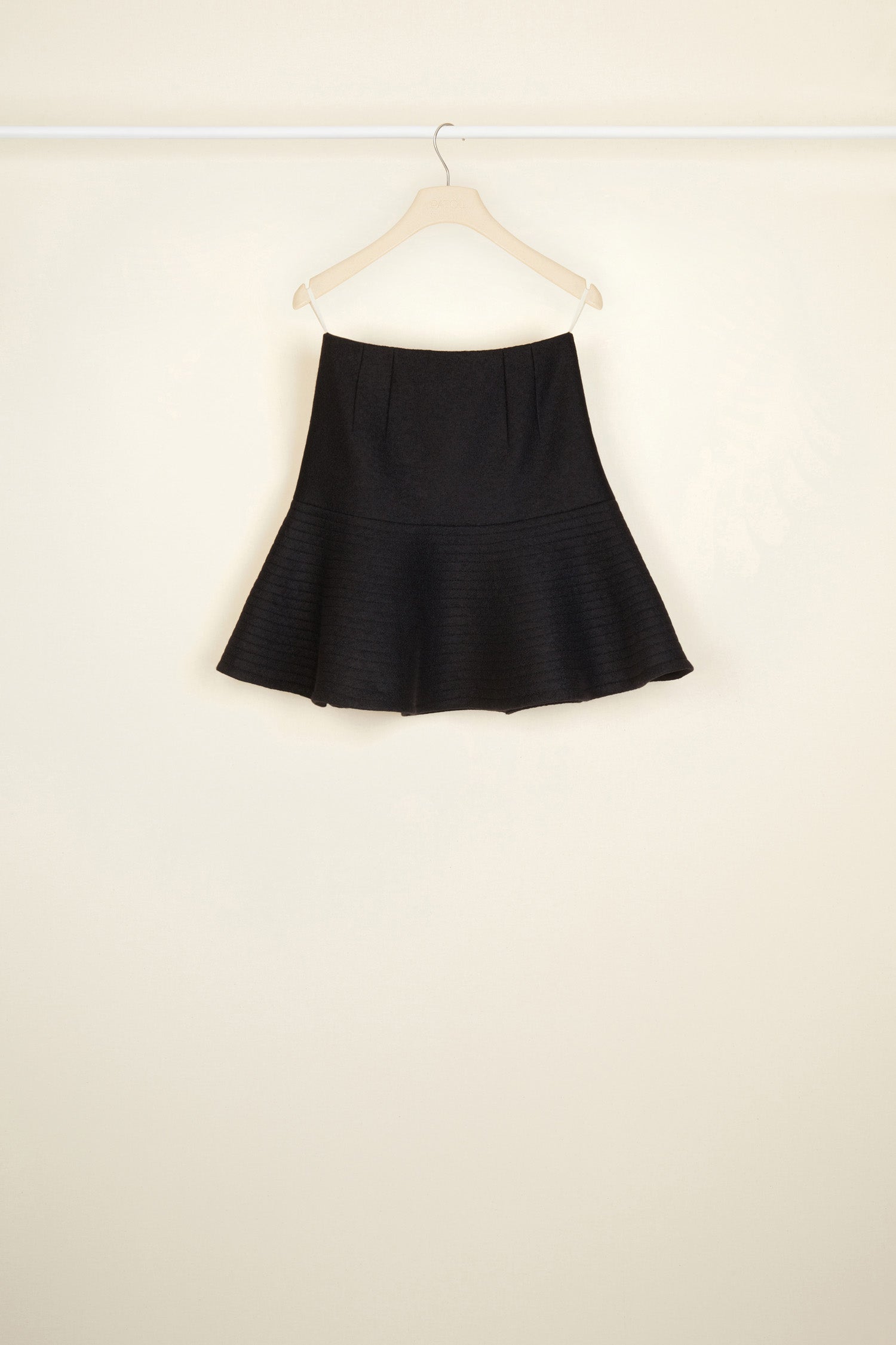 Patou - 3D mini skirt - Black - Oui, oui, oui: three cheers for the 3D mini!Black boiled wool 3D mini skirt. Godet silhouette. Topstitching all over to create a voluminous wavy effect. Darts at the front and back. Zip fastening at the back.