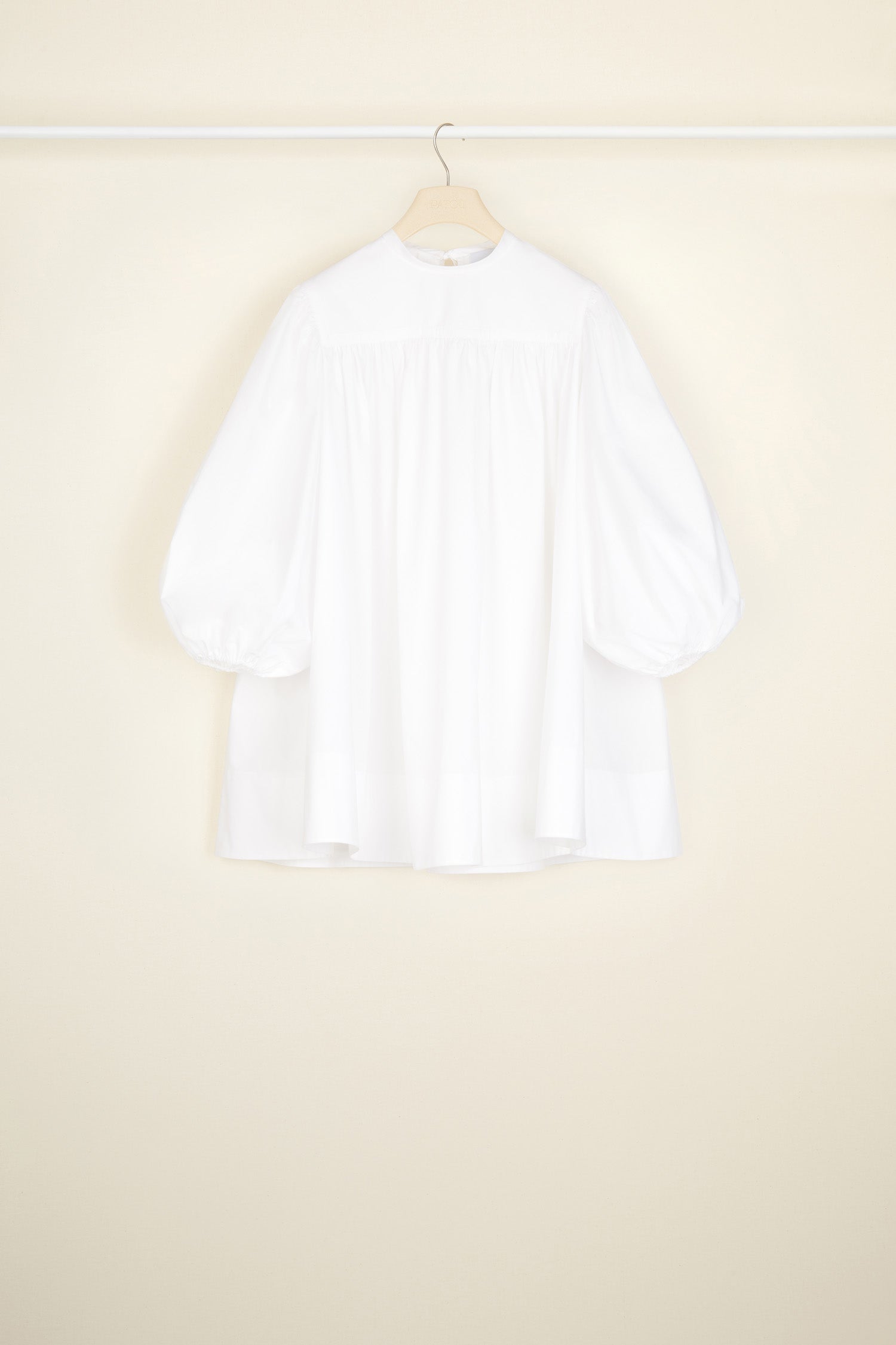 Patou - Communion cotton top - White - Fine details that speak volumes.White organic cotton poplin top. Oversized silhouette. Round collar with yoke and tie fastening at the back. Puff sleeves with elasticated cuffs.