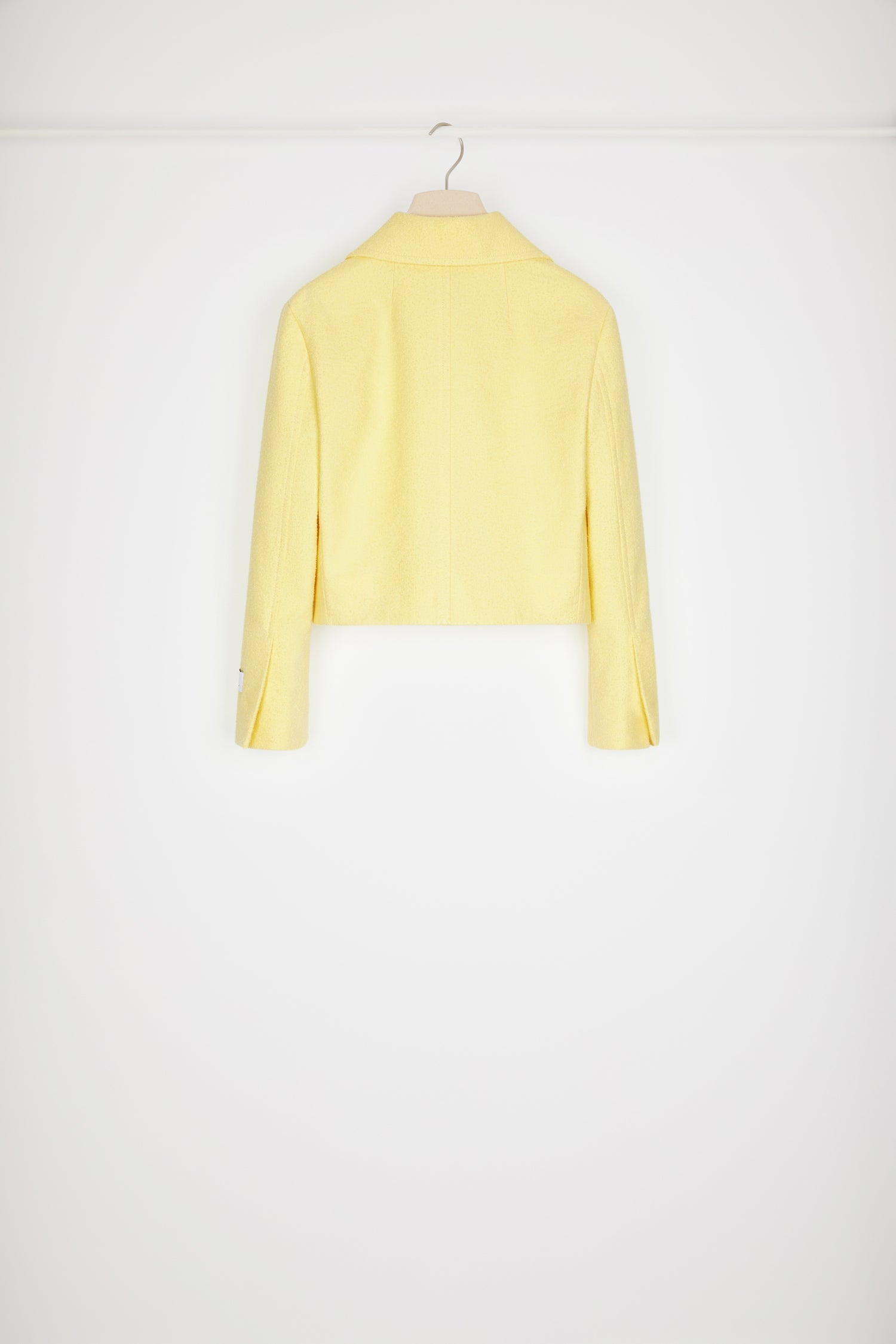 Patou - Short tailored jacket in cotton-blend tweed - Mimosa - Tailored to Patou perfection. Mimosa yellow cotton-blend tweed jacket. Cropped silhouette. Wide collar. Button fastening at the front with gold-tone Patou-engraved buttons. Patch pockets at the front. Patou label on the left sleeve. Split cuffs. Fully lined.Spring-Summer 2023 Show - Look #19