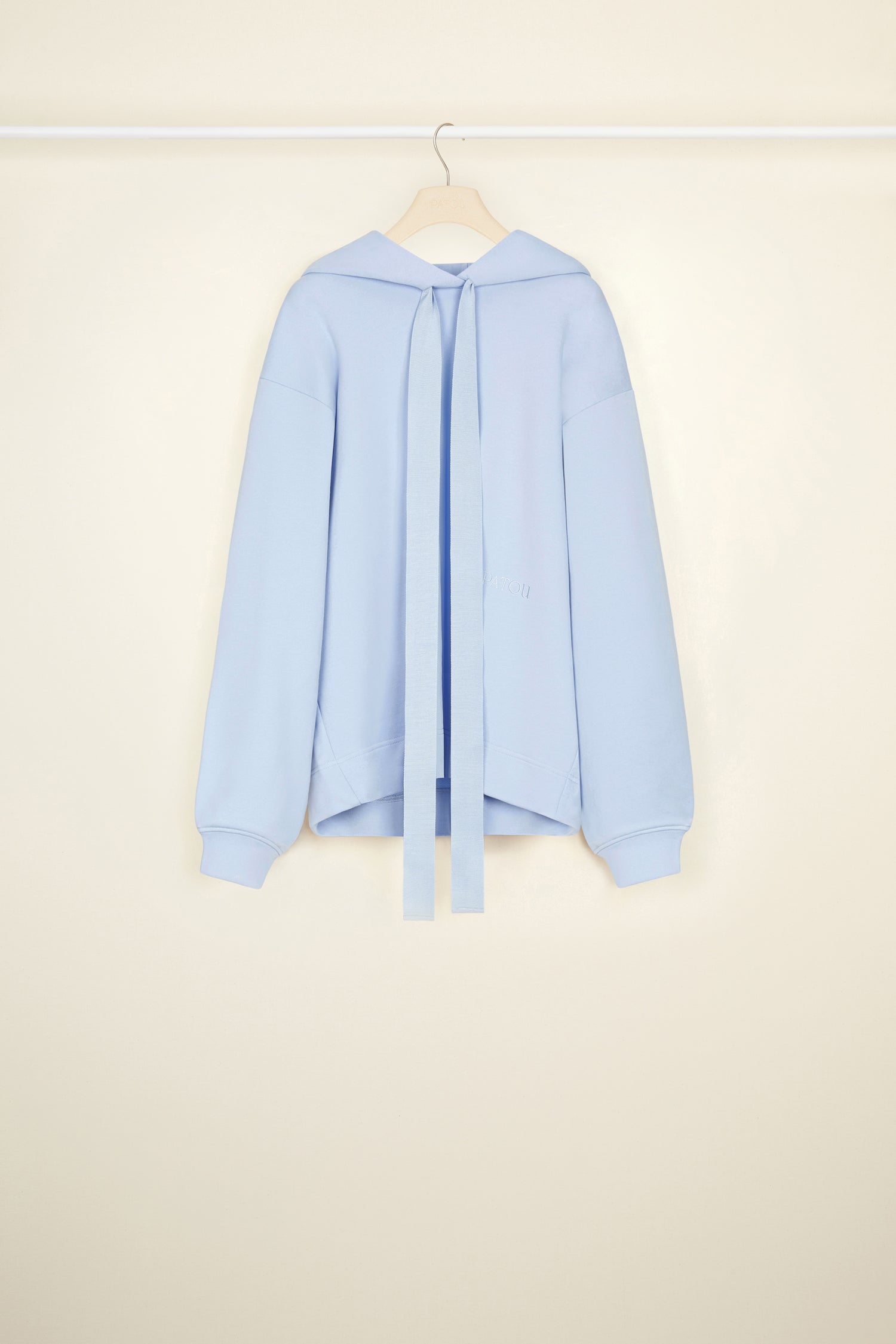 Patou - Patou grosgrain hoodie in organic cotton - Aurora - An everyday uniform for the whole Patou crew. Aurora light blue organic cotton hoodie. Unisex style. Hooded collar with grosgrain drawstring. Dropped embossed shoulders. Patou lettering logo embroidered at the front. Patou lettering logo printed in white across the back. Ribbed cuffs.Loose fit (select one size down for a fitted look).