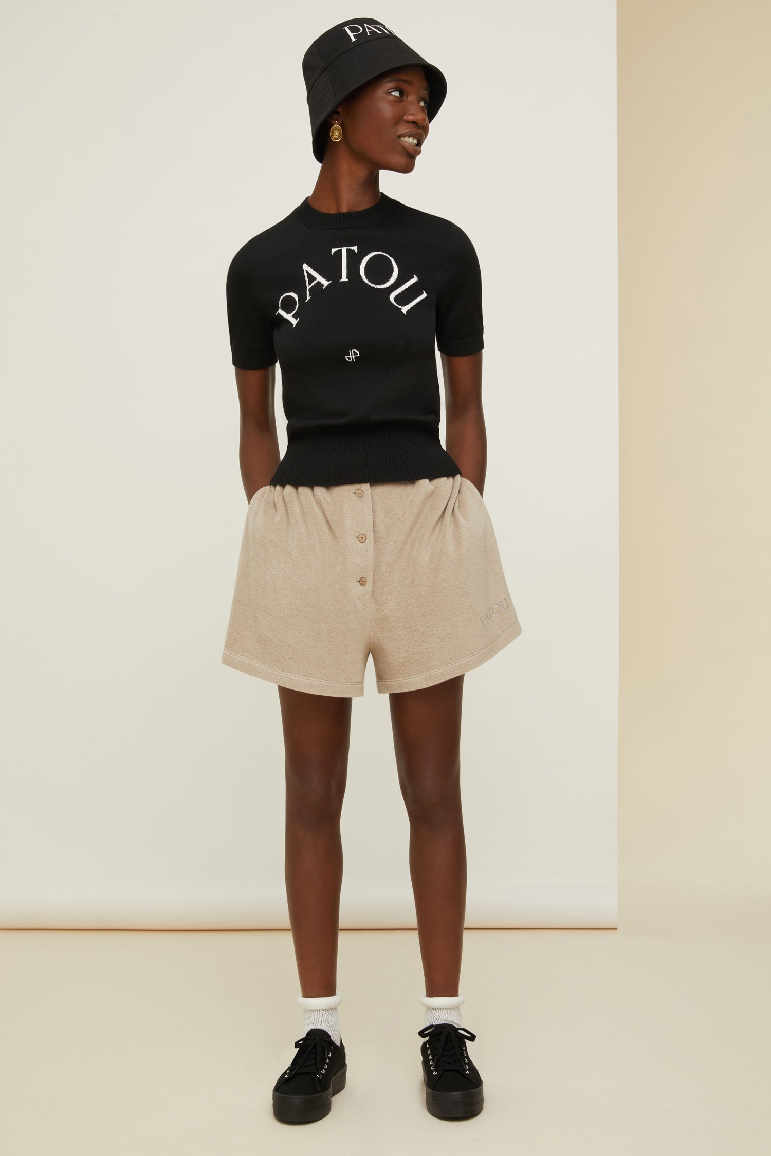 Patou - Terry boxer shorts in organic cotton blend - Parchment - Smile harder, dress softer.Parchment beige terry shorts in organic cotton blend. Elasticated waist. Button fastening at the front with JP engraved buttons. Seam pockets at the sides. Patou lettering logo embroidered at the front.