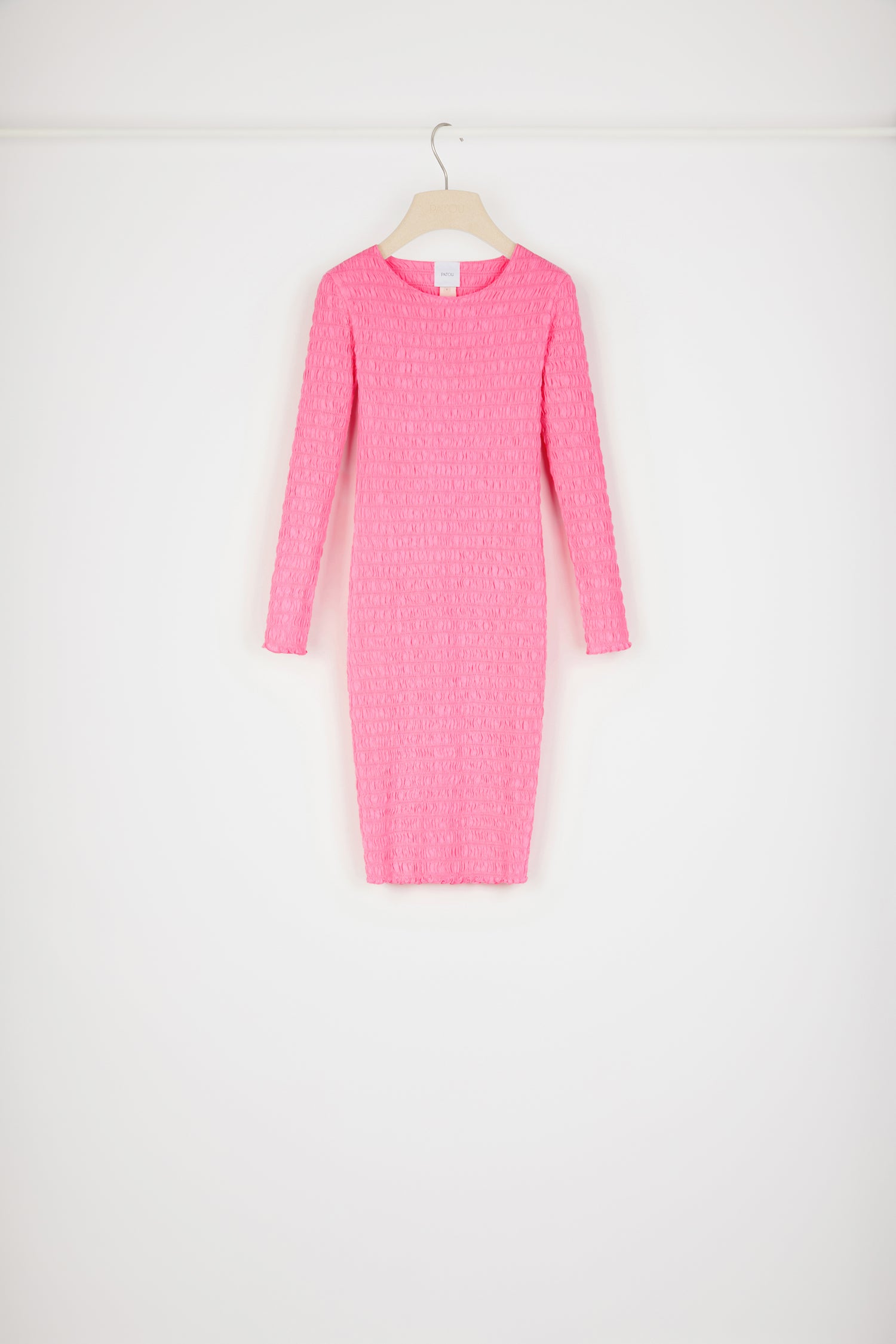 Patou - Smock dress in organic cotton - Begonia Pink - Smocking allowed - and very much encouraged!Begonia pink organic cotton dress. Fitted style. Smocked detailing all over. Round neckline. Long sleeves. Tonal JP monogram appliqué at the back.This dress is very skin-tight and fitted.