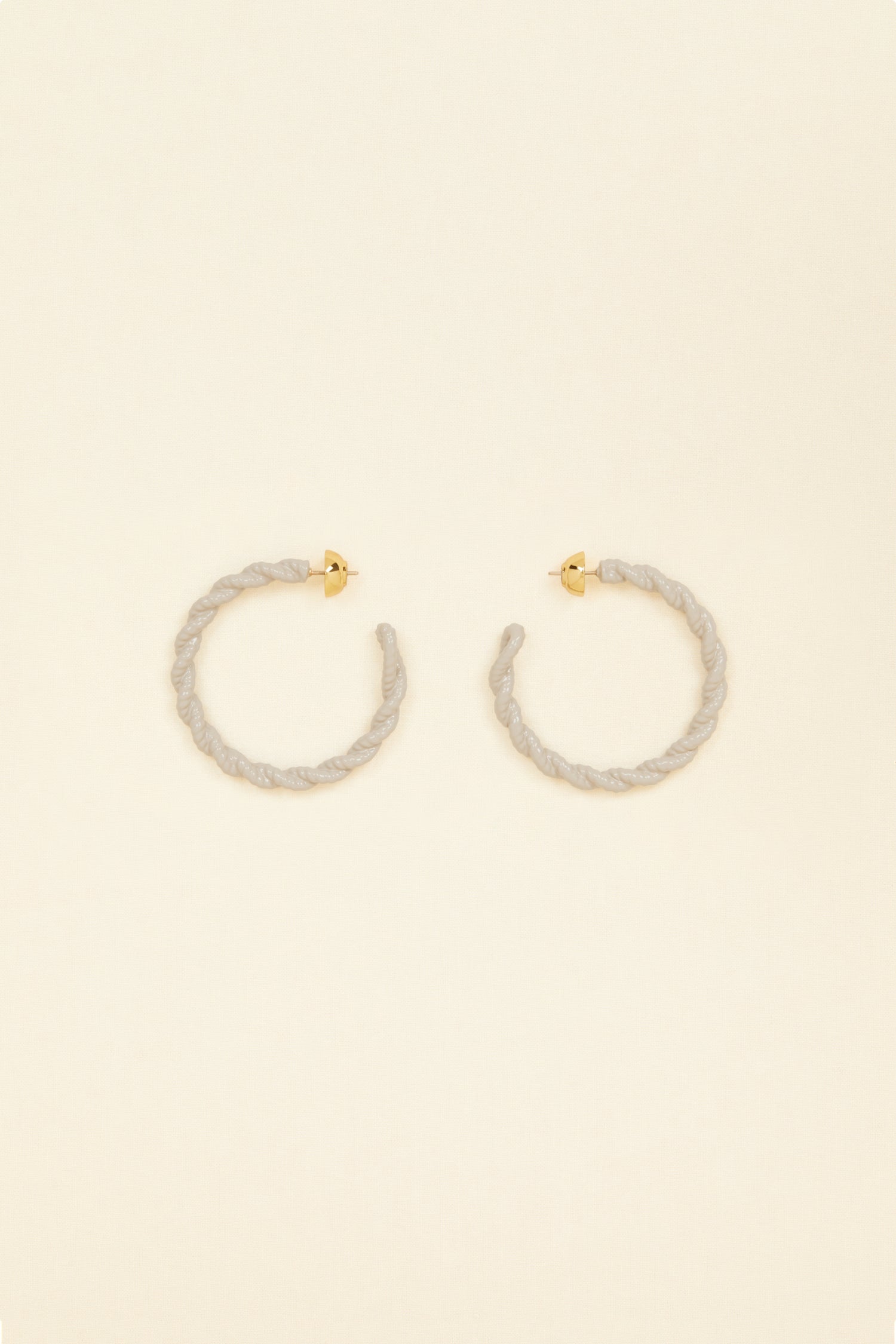 Patou - Large braided hoop earrings - Dove - Hoops, we did it again. Dove grey painted brass open hoop earrings. Bell back fastening suitable for pierced ears.