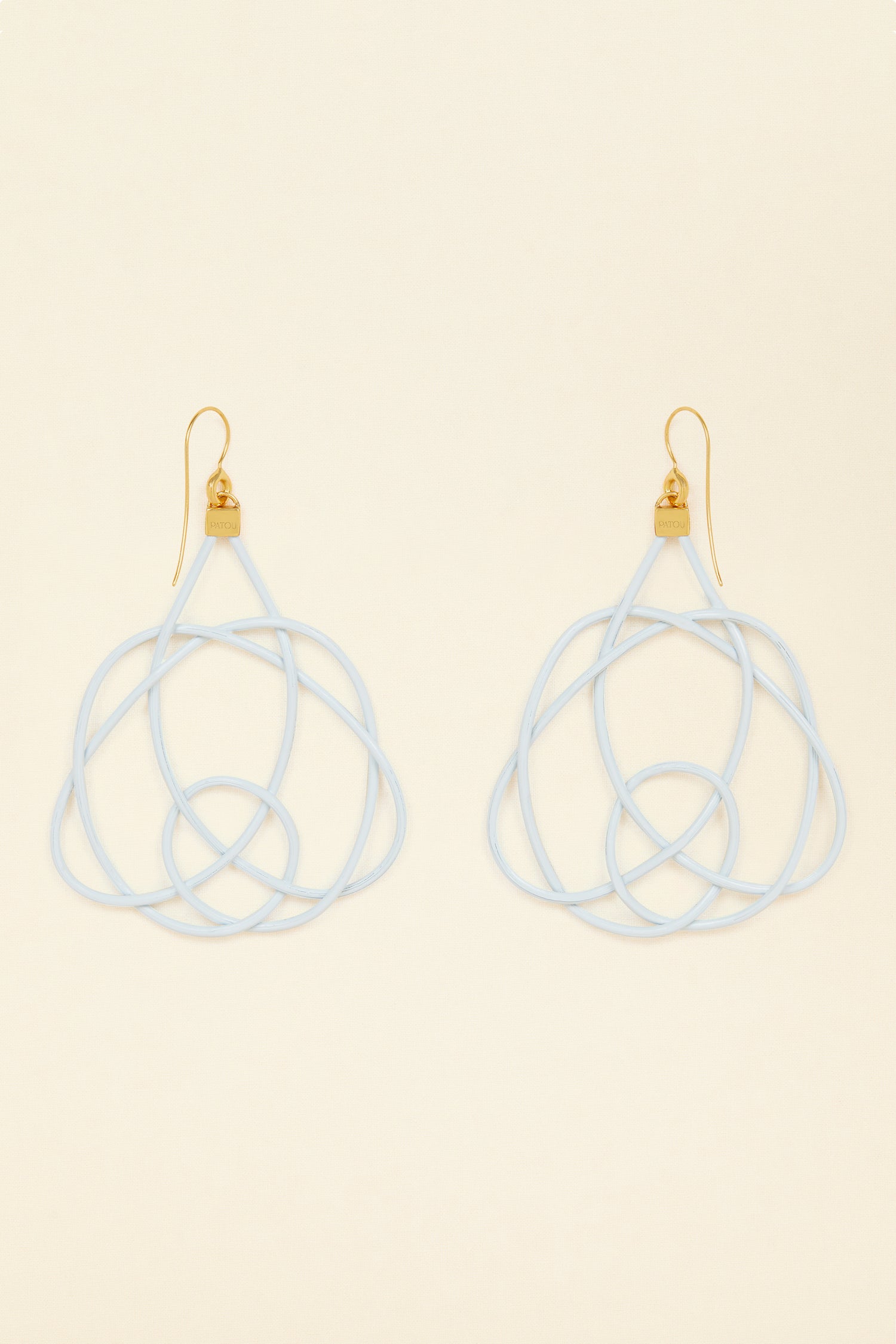 Patou - Wicker earrings - Sky Blue - Lighter, brighter, our favourite earrings are made of wicker.Sky Blue painted wicker earrings. Symmetric curved shape. Hook fastening suitable for pierced ears.