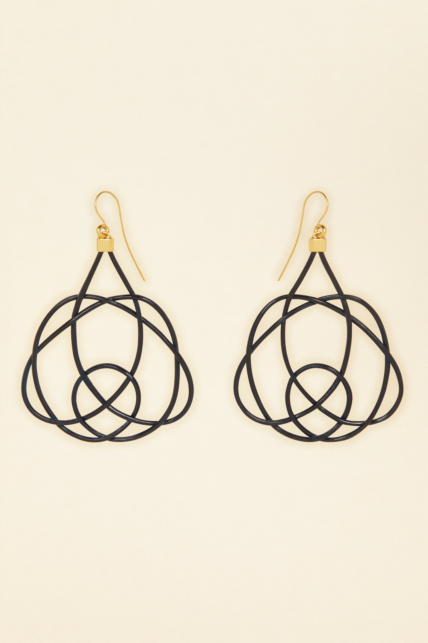 Patou - Wicker earrings - Night Blue - Lighter, brighter, our favourite earrings are made of wicker.Night Blue painted wicker earrings. Symmetric curved shape. Hook fastening suitable for pierced ears.