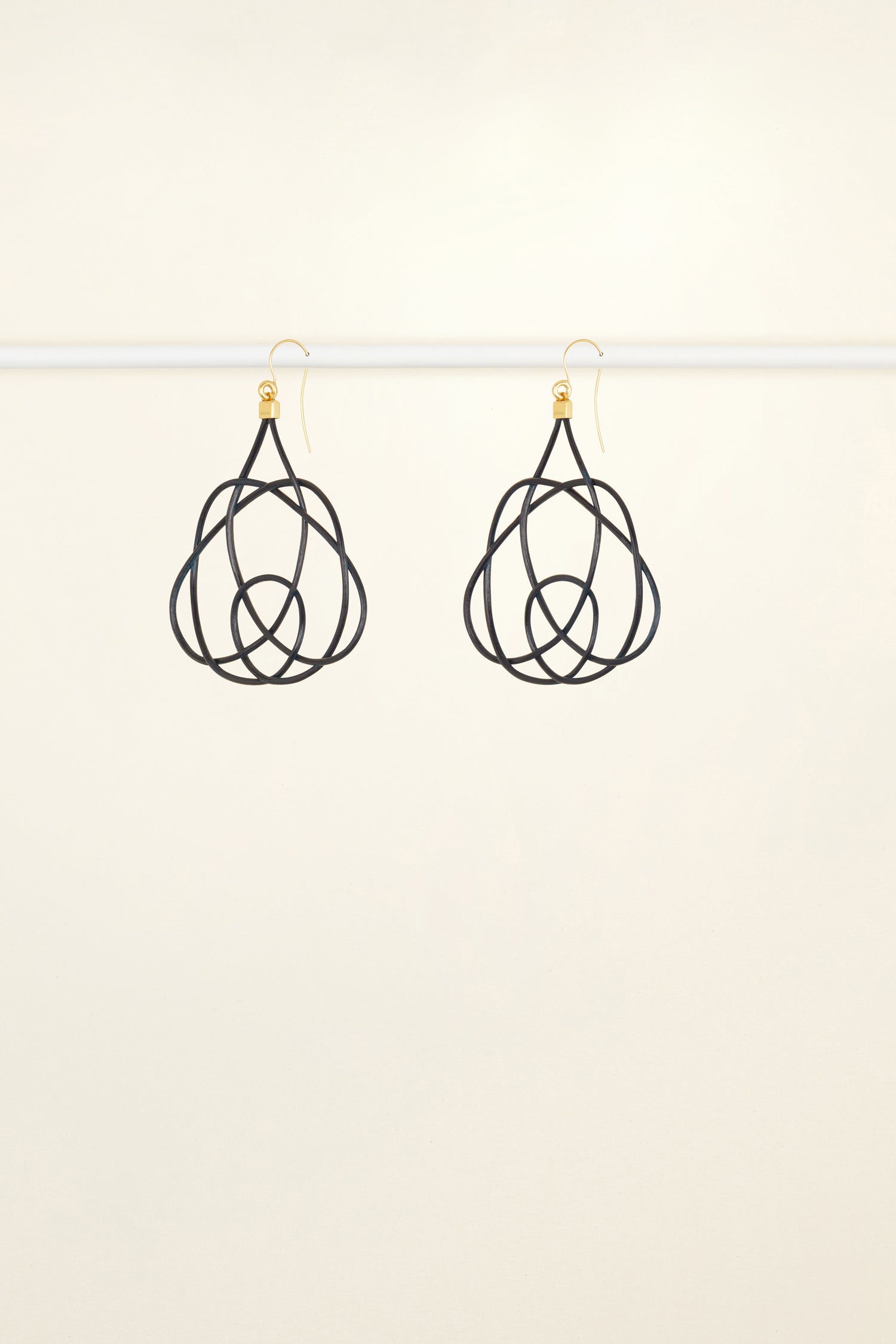 Patou - Wicker earrings - Night Blue - Lighter, brighter, our favourite earrings are made of wicker.Night Blue painted wicker earrings. Symmetric curved shape. Hook fastening suitable for pierced ears.