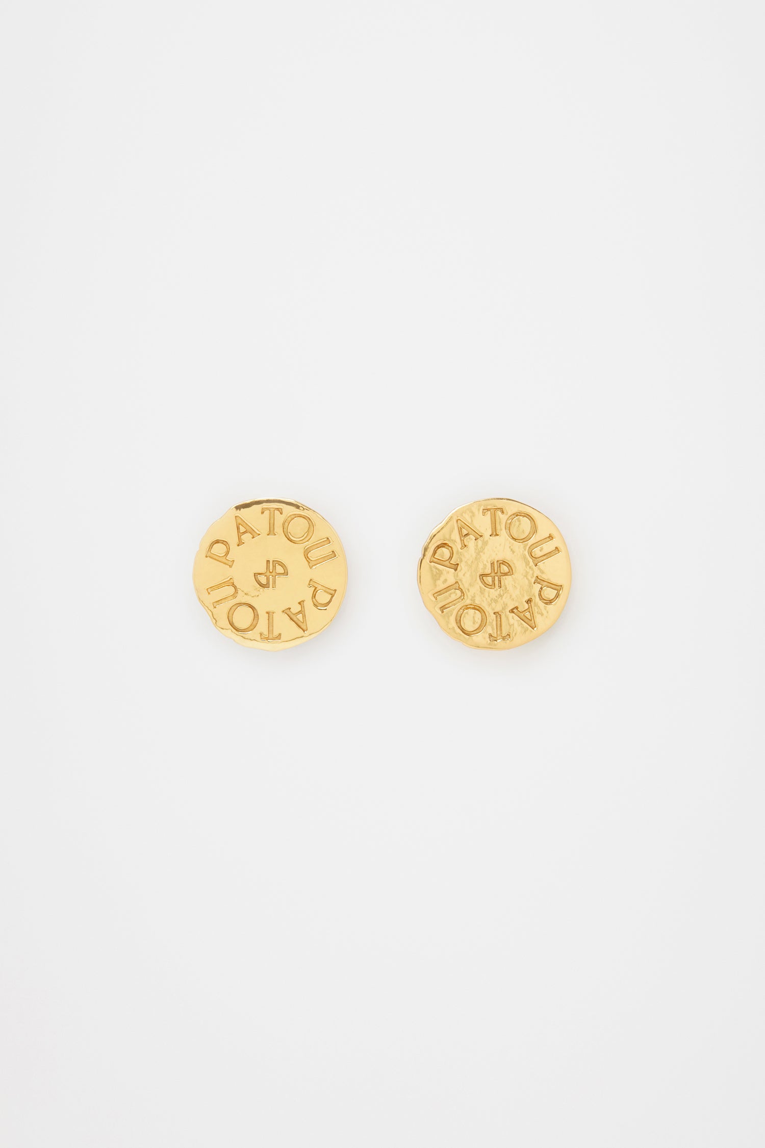 Patou - Coin earrings in gold-plated brass - Gold - Gold-plated brass earrings. Antique coin inspiration. Hammered texture. Engraved Patou logo with JP monogram at the center. Push-back closure.Clip-on version also available.
