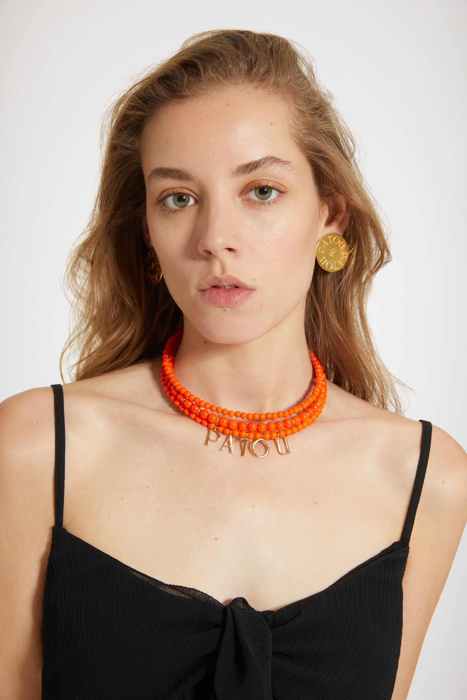 Patou - Patou coloured glass-bead necklace - Marigold - Pearls that pop, by Patou.Marigold orange glass bead necklace. Multiple strands with assorted size pearl-style beads and gold-tone details. Gold-plated Patou letters. Gold-tone clasp fastening with JP-engraved medallion.
