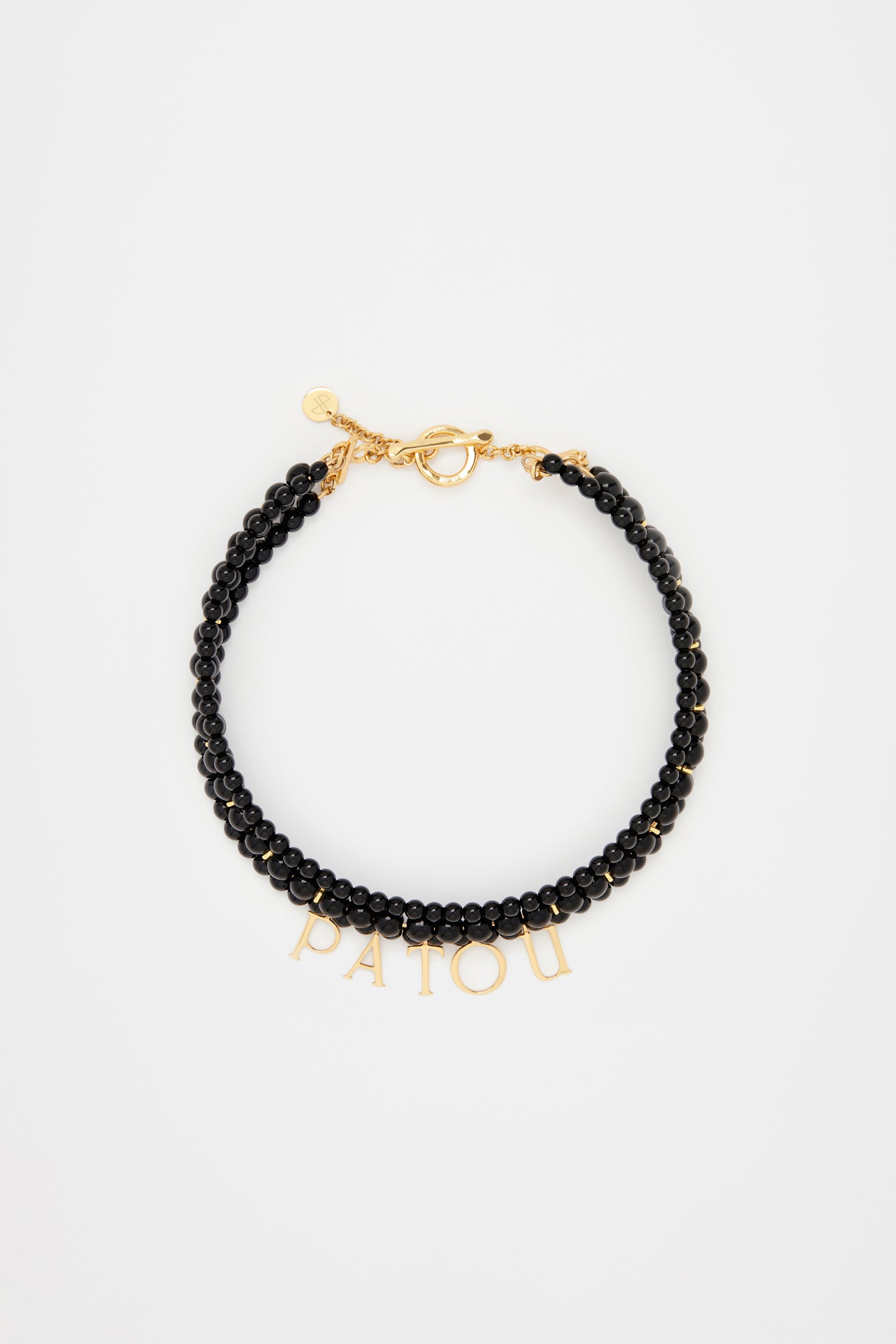 Patou - Patou coloured glass-bead necklace - Black - Pearls that pop, by Patou.Black glass bead necklace. Multiple strands with assorted size pearl-style beads and gold-tone details. Gold-plated Patou letters. Gold-tone clasp fastening with JP-engraved medallion.