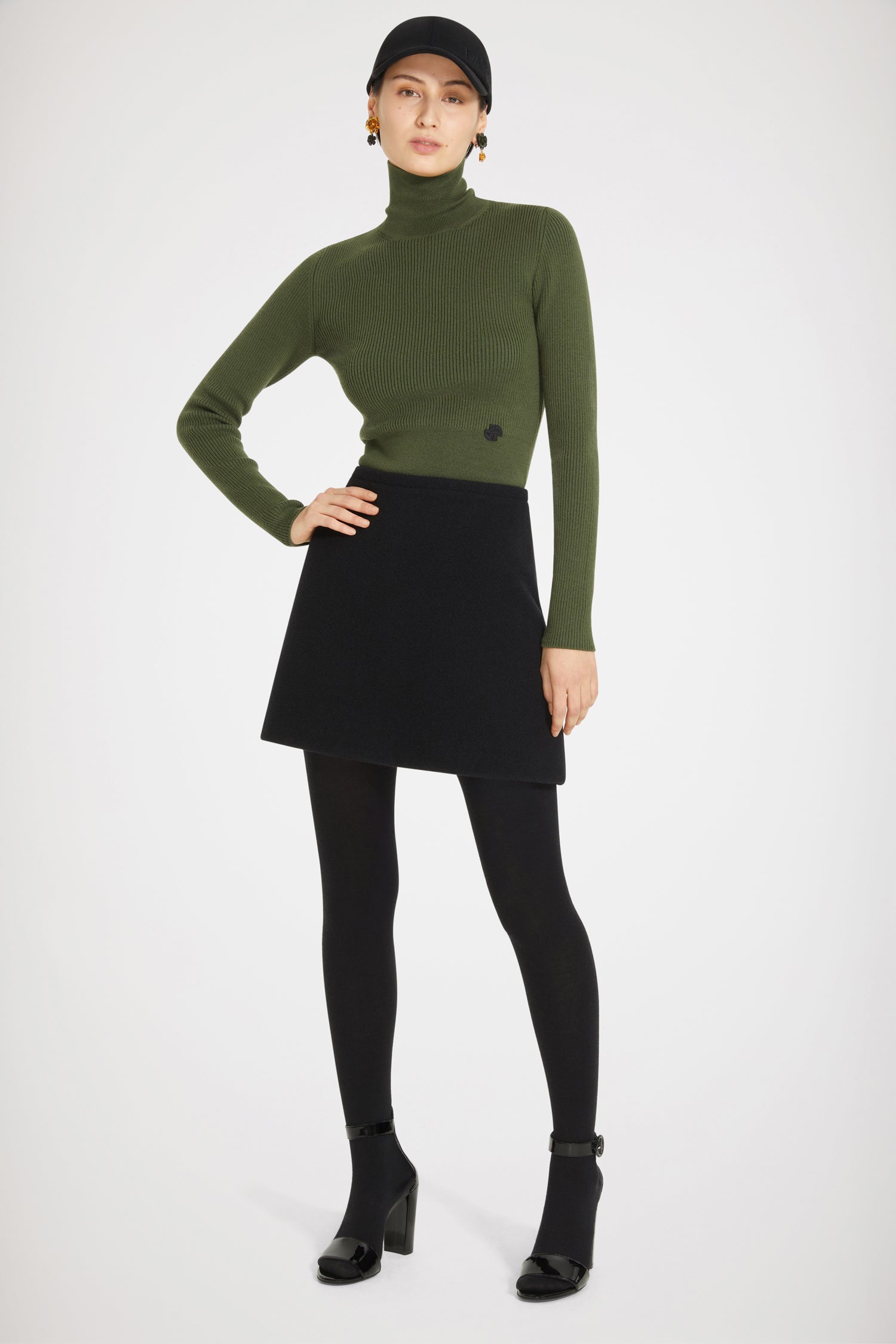 Patou - High neck rib knit wool blend jumper - Loden - The perfect style staple to keep layering chic and simple. Loden green rib knit wool blend jumper. Fitted style with a high neck. Cropped silhouette. Small white JP logo at the front.