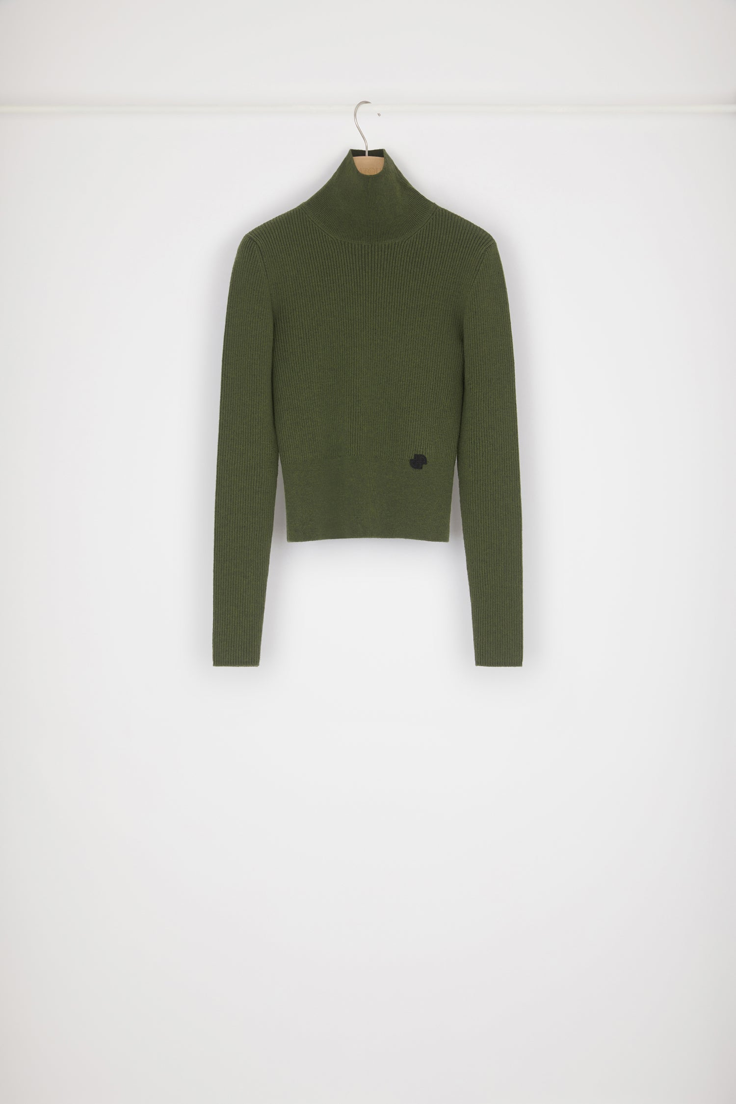 Patou - High neck rib knit wool blend jumper - Loden - The perfect style staple to keep layering chic and simple. Loden green rib knit wool blend jumper. Fitted style with a high neck. Cropped silhouette. Small white JP logo at the front.