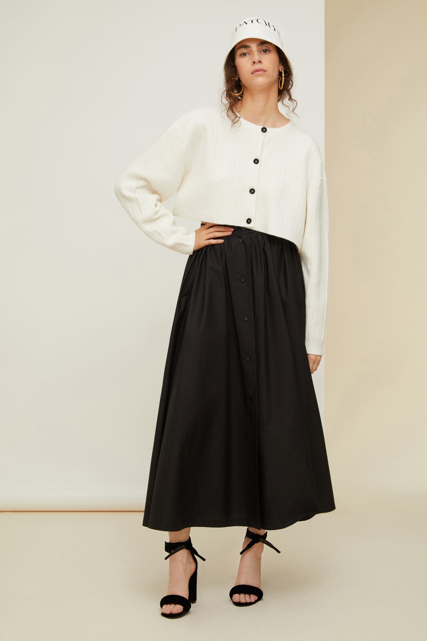 Patou - Cropped cable knit cardigan in recycled wool blend - White - Cable + cropped: the new knitwear equation.White recycled wool blend cardigan. Cropped silhouette. 3D cable knit detailing. Round neckline. Button fastening at the front with JP engraved buttons.