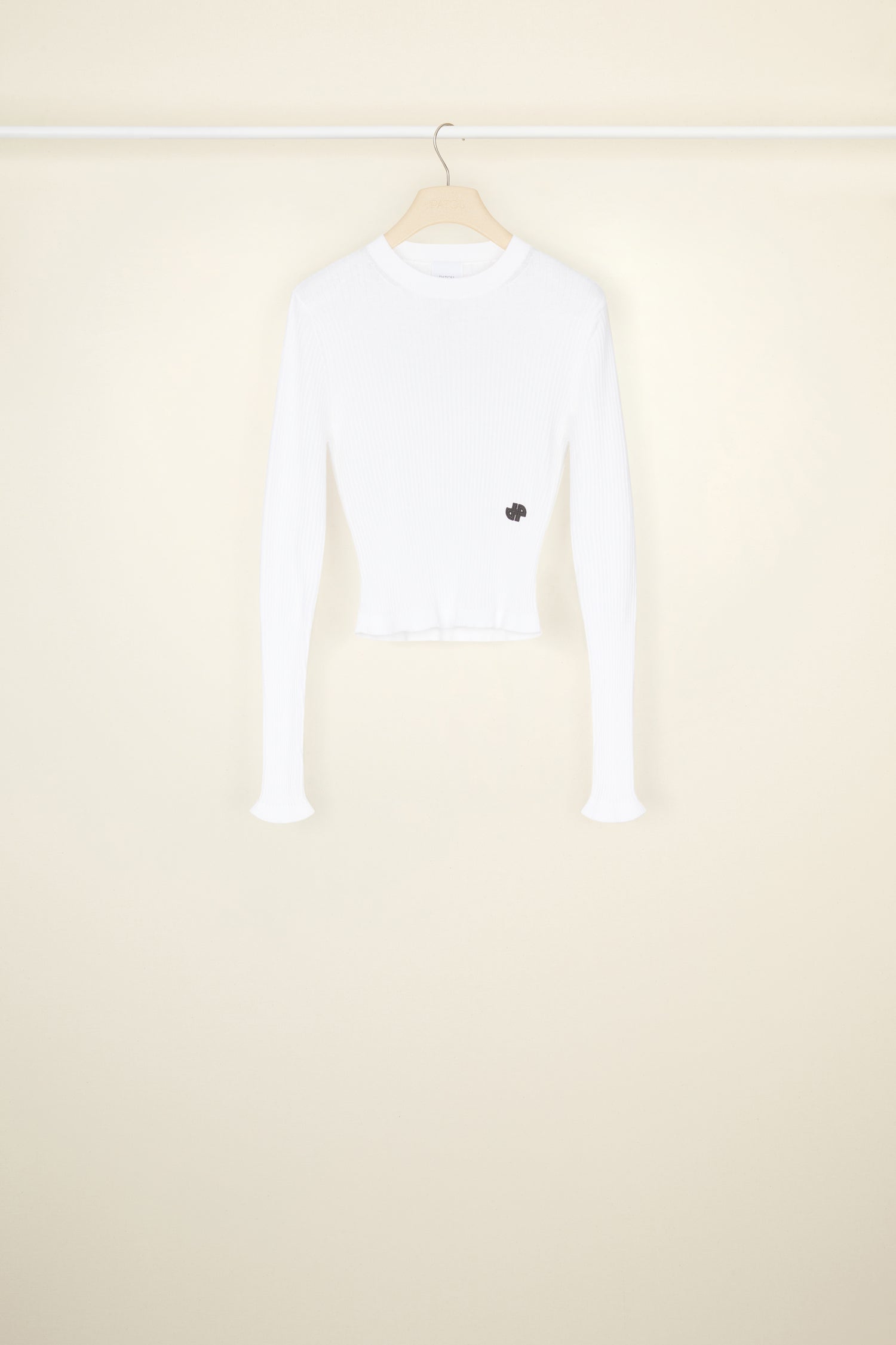 Patou - Fitted rib knit jumper in organic cotton - White - The perfect base layer to wear in every colour!White organic cotton jumper. Fitted silhouette. Rib knit style. Crewneck. Long sleeves with slightly flared cuffs. Embroidered JP logo in black at the front.