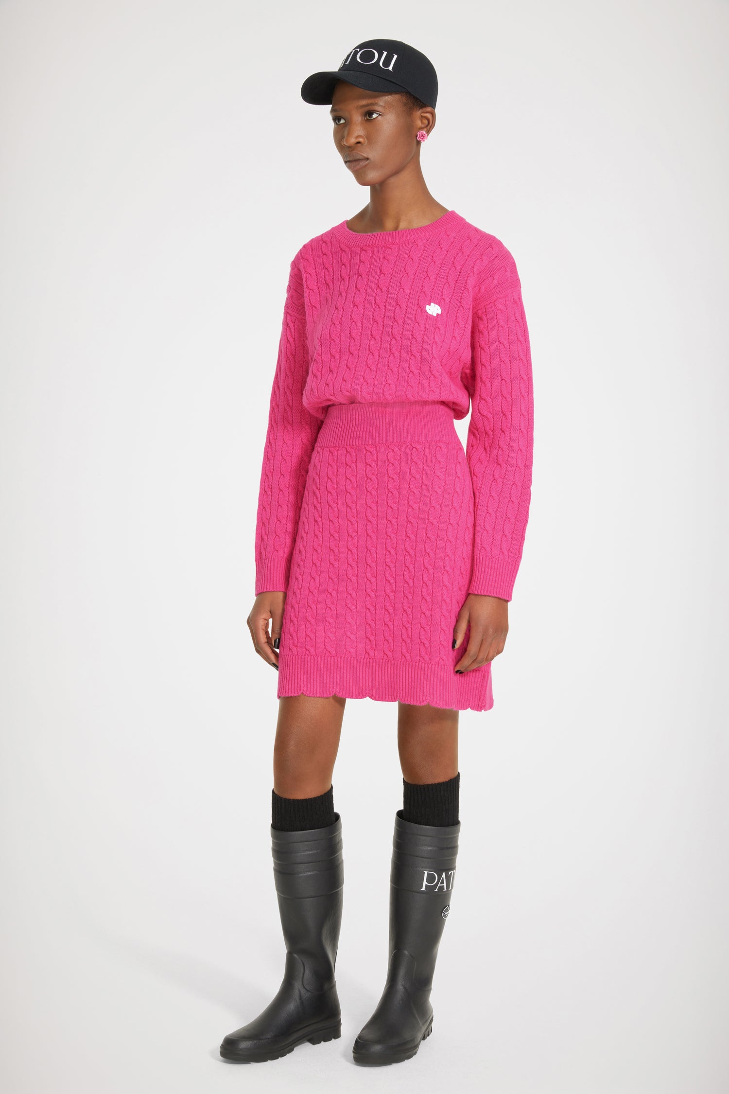 Patou - Gonna con trecce in lana - Fuchsia - Le trecce sottolineano la gonna.Gonna in lana merino fuchsia. Dettaglio di trecce. Vestibilità aderente. Vita alta. Orlo a scaloppina.