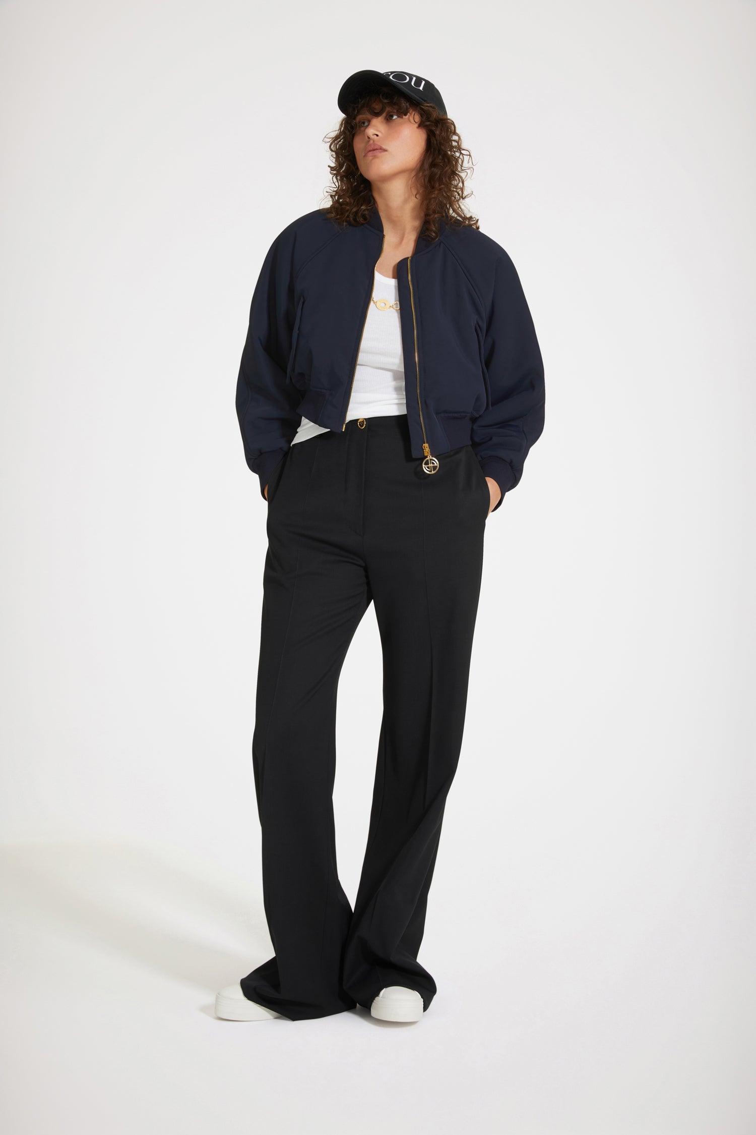 Patou - Cropped bomber jacket in recycled nylon - Night Blue - A bomber fit for a member of the Patou crew.Night blue recycled tech nylon bomber. Cropped silhouette. Rib knit collar, cuffs and waist. Gold-tone zip fastening with signatue JP puller. Raglan sleeves. Diagonal pockets with gold-tone press buttons at the front. Patou logo and JP monogram at the back.