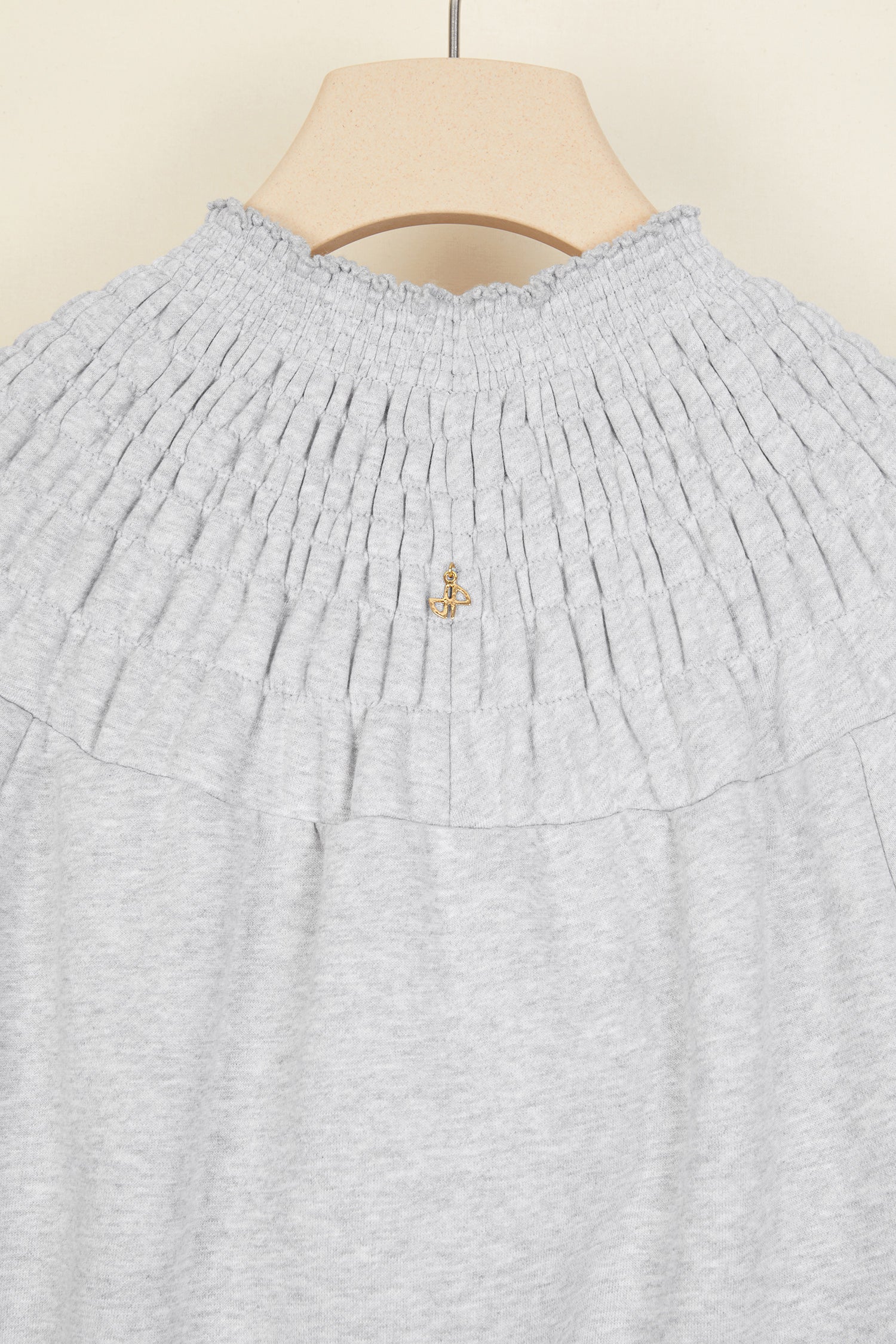 Patou - Smock collar cotton sweatshirt - Grey - Smocks go casual.Lightweight grey cotton sweatshirt with a sunray smocked collar that can be worn off the shoulders. Gold-coloured JP logo at the back. Three-quarter puff sleeves with elasticated cuffs. Two slits at the sides.