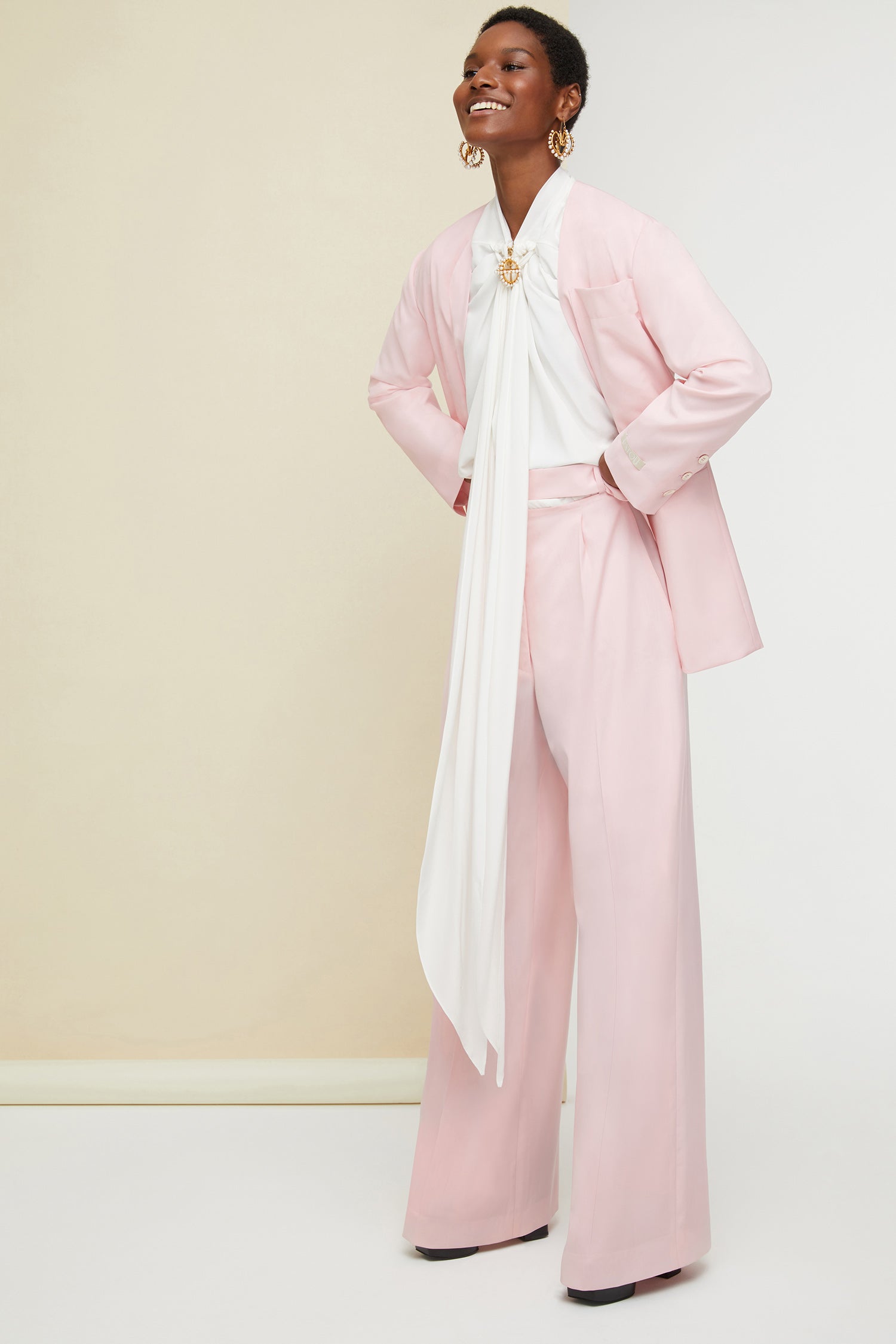 Patou - Lavallière silk bomber - Pearl - Lavallière everywhere!Pearl silk bomber jacket. Lavallière collar with ruched detailing and loose ties. Gold-coloured zip at the front. Signature rounded seam at the back. Elasticated hem and cuffs. Pearl brooch sold separately.
