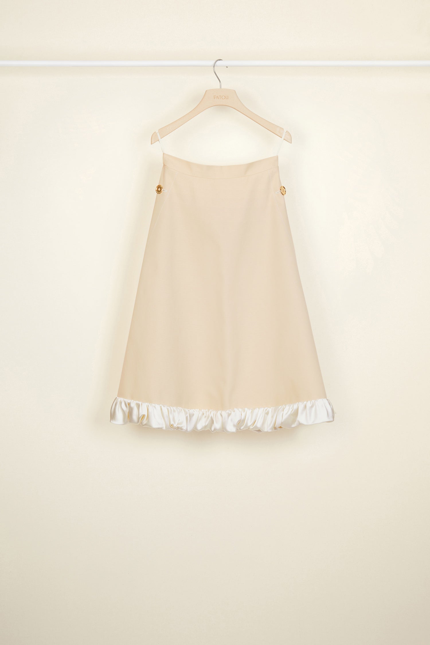 Patou - Cotton safari skirt - Vanilla - The summer skirt goes on an adventure.Vanilla Panama cotton midi skirt. A-line silhouette designed to sit slightly lower on the waist. Two side pockets with JP logo-engraved gold buttons. Zip fastening at the back. Ruffled bubble hem in contrasting satin.