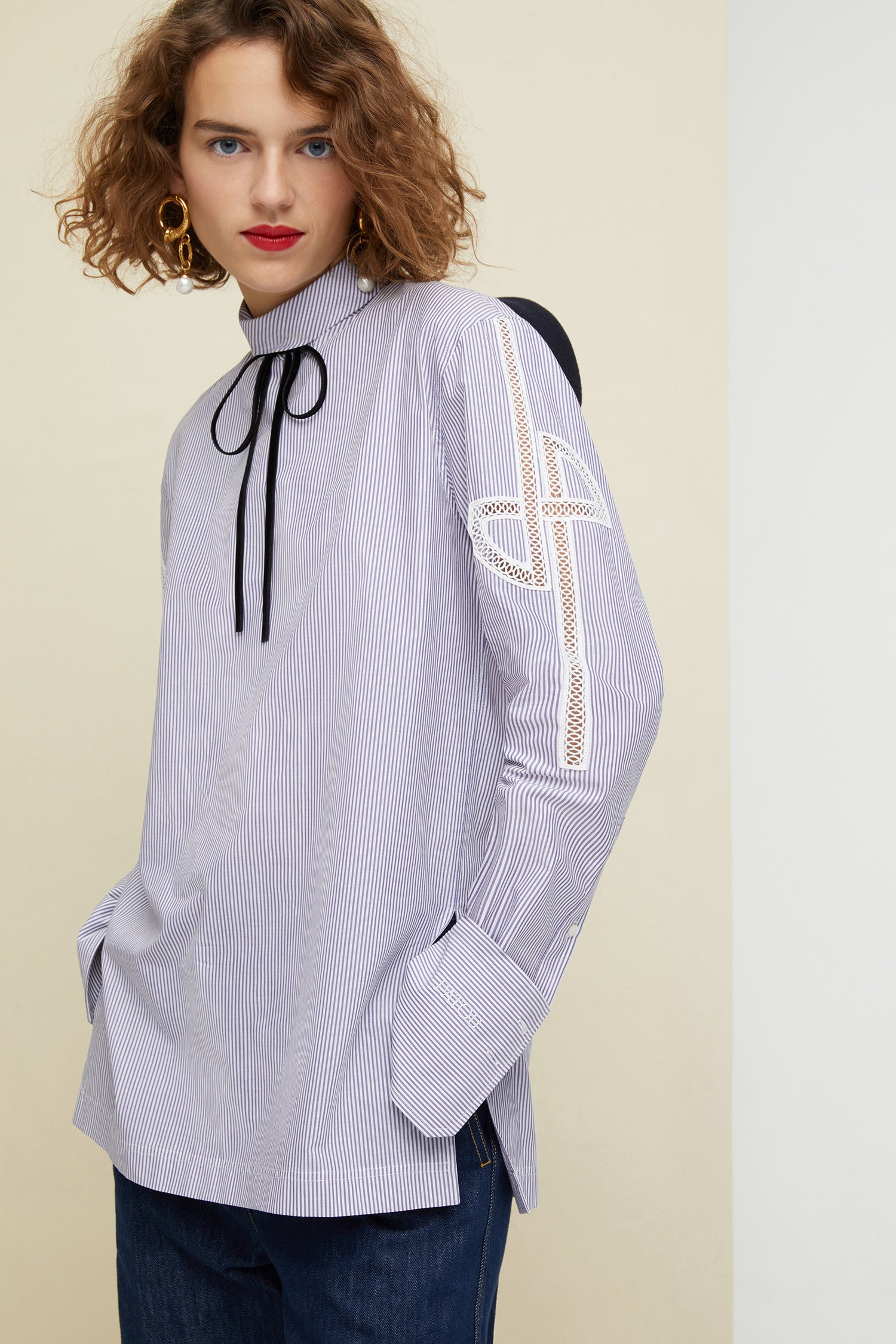 Patou - Guipure cut-out cotton top - Biarritz - The elaborate art of embroidery.Biarritz stripe cotton poplin top. High collar with button fastening at the back. Cut-out JP logo on both sleeves. Buttoned cuffs with embroidered Patou logo on the left sleeve. Side slits.