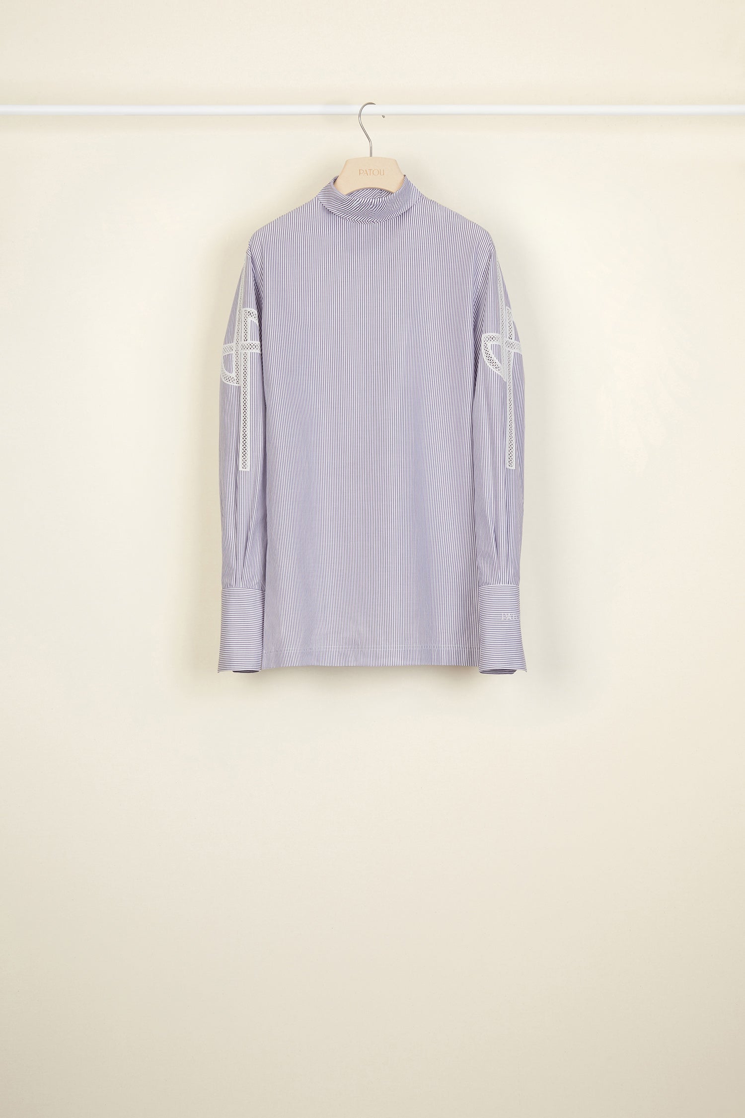 Patou - Guipure cut-out cotton top - Biarritz - The elaborate art of embroidery.Biarritz stripe cotton poplin top. High collar with button fastening at the back. Cut-out JP logo on both sleeves. Buttoned cuffs with embroidered Patou logo on the left sleeve. Side slits.