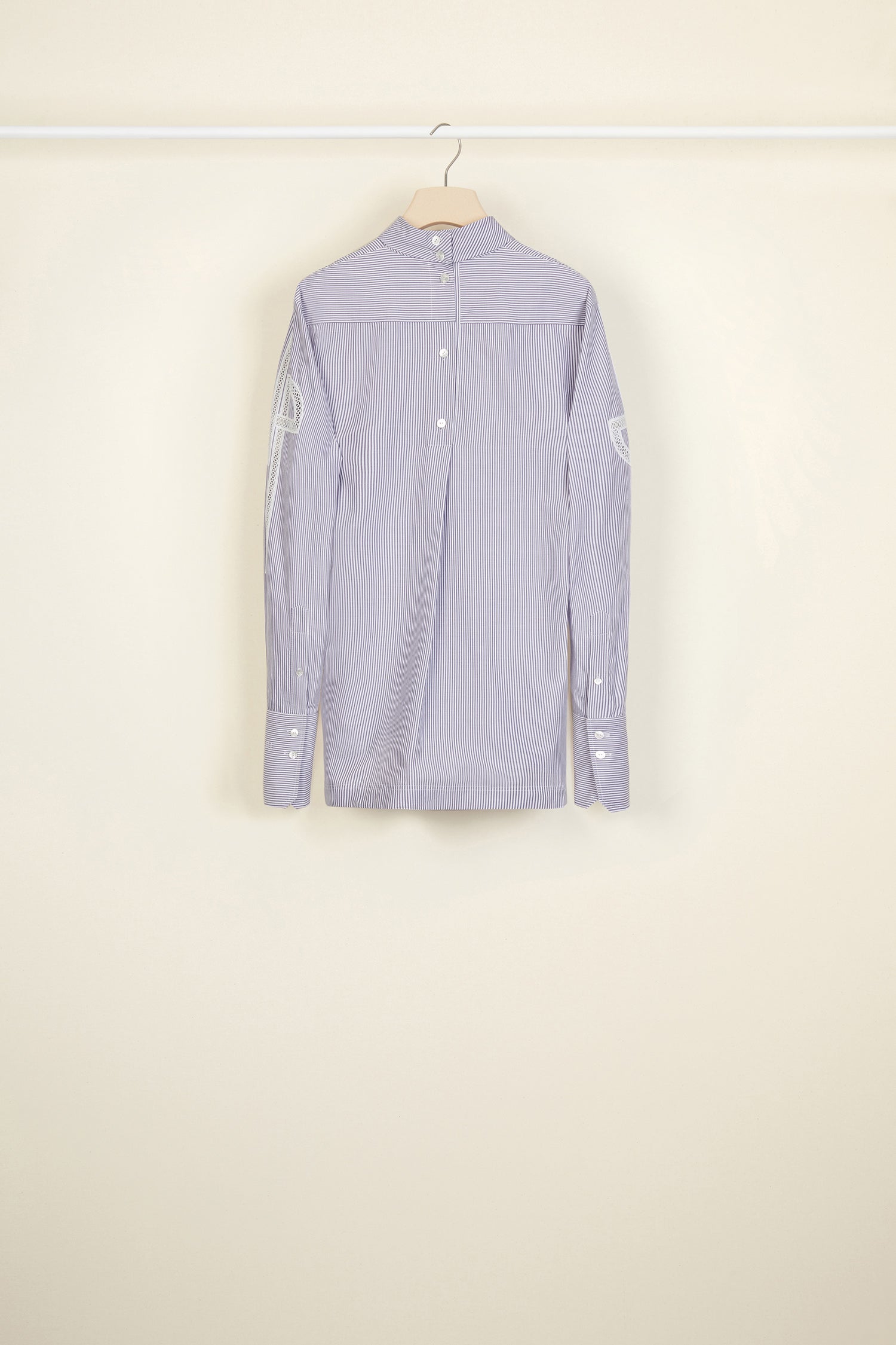 Patou - Guipure cut-out cotton top - Biarritz - The elaborate art of embroidery.Biarritz stripe cotton poplin top. High collar with button fastening at the back. Cut-out JP logo on both sleeves. Buttoned cuffs with embroidered Patou logo on the left sleeve. Side slits.