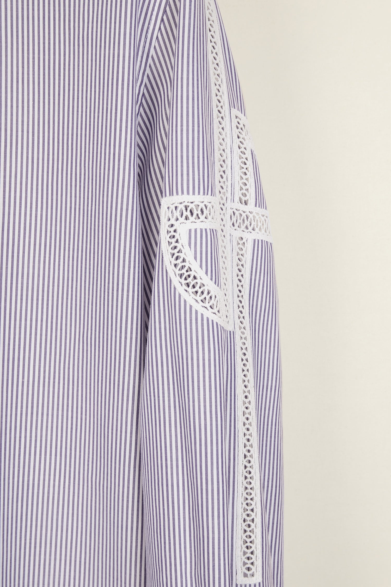 Patou - Guipure cut-out cotton top - Biarritz - The elaborate art of embroidery.Biarritz stripe cotton poplin top. High collar with button fastening at the back. Cut-out JP logo on both sleeves. Buttoned cuffs with embroidered Patou logo on the left sleeve. Side slits.