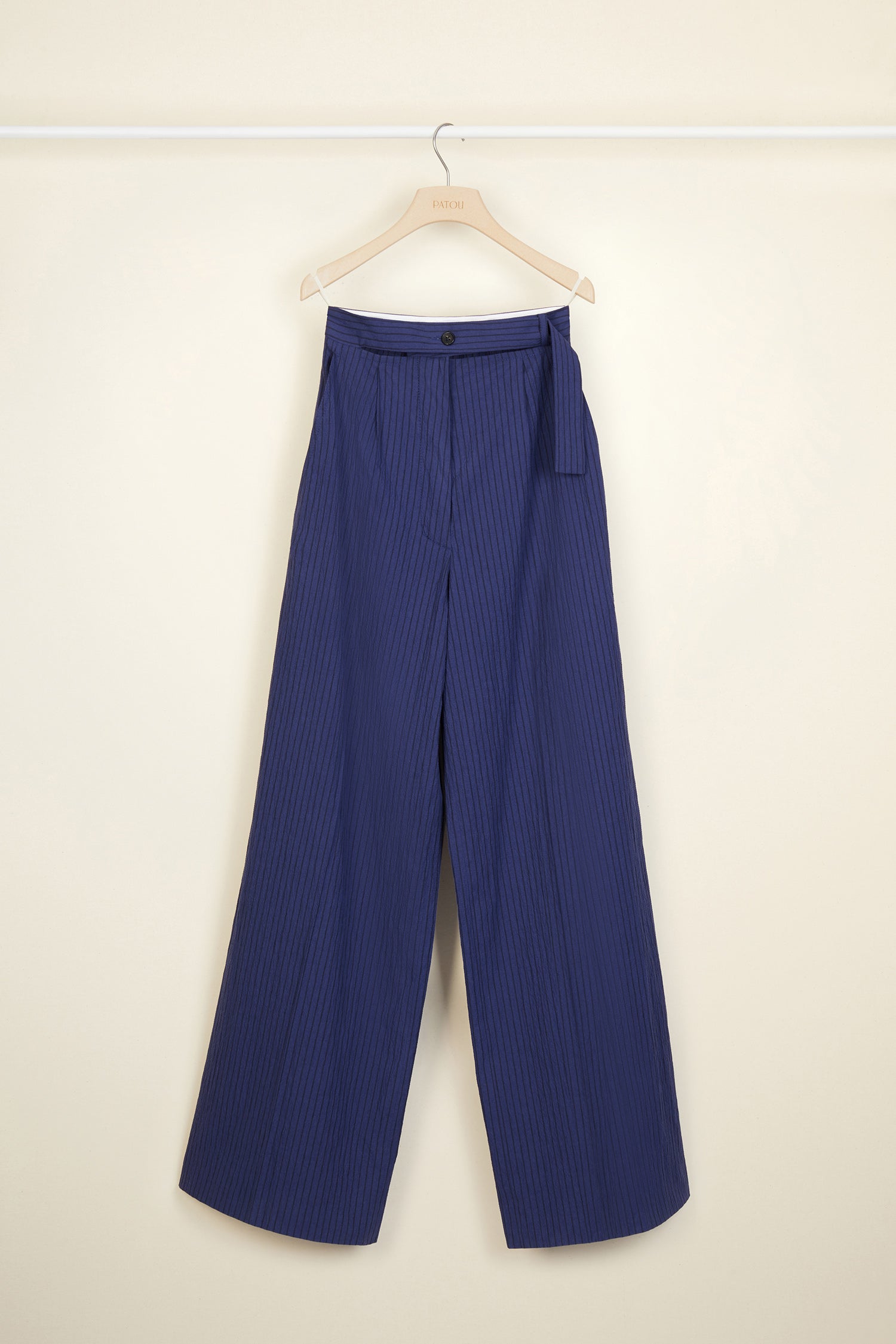 Patou - Loose belted seersucker trousers - Persian Blue - The new seersucker.Persian blue cotton and linen seersucker trousers. Loose fit. High-waisted style with a partly detached belt. JP logo-engraved button. Darts at the front, pockets at the sides.