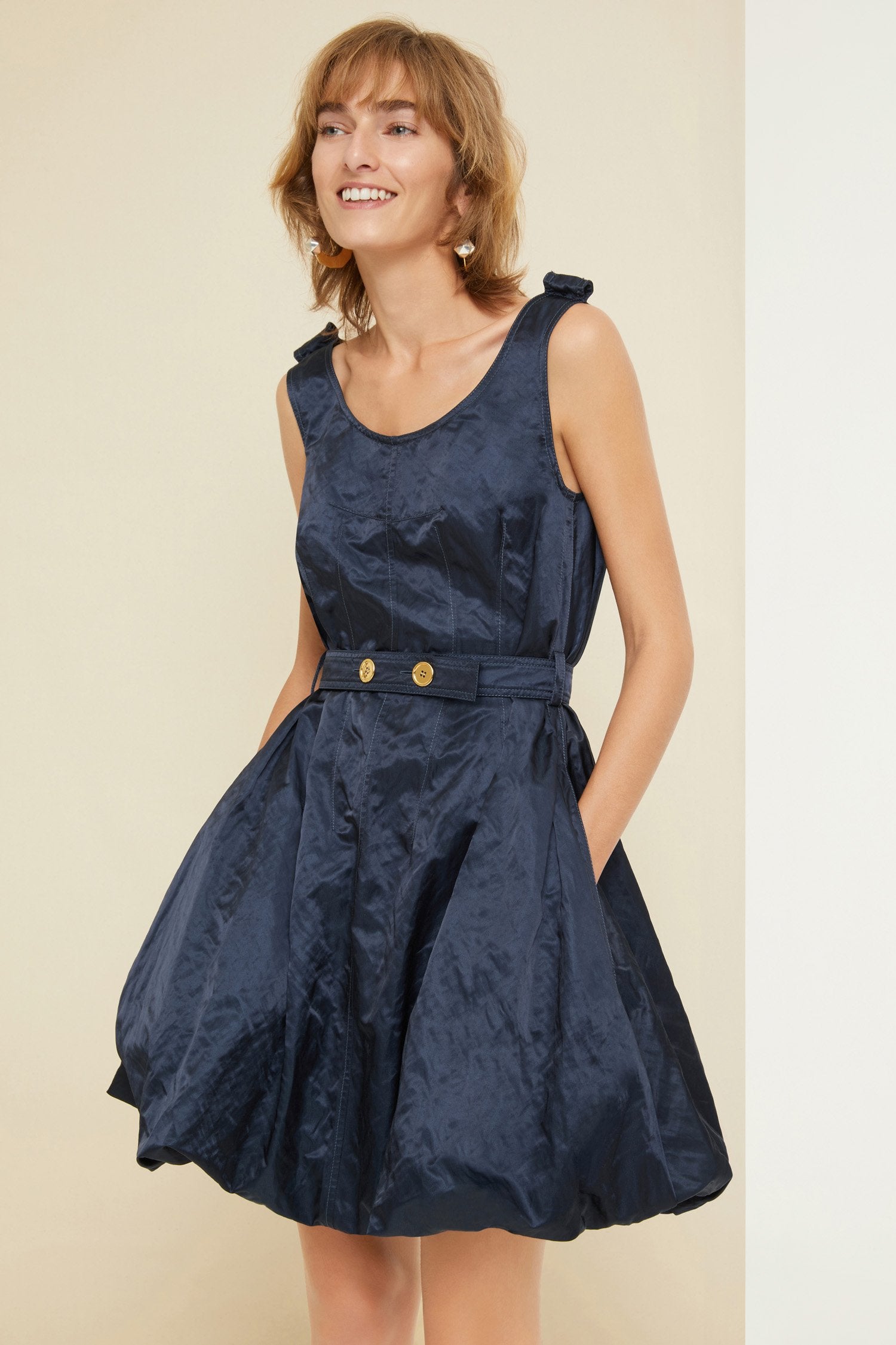 Patou - Bubble hem dress in metal satin - Sapphire Blue - Short or not-so-short, a dress tailored to your wishes. Sapphire blue bubble hem dress. Metal satin with a natural rumpled look. Scoop neckline with wide straps. Zip fastening at the back. Belt at the waist with two engraved gold-coloured buttons. Pockets at the sides. Elasticated hem that allows the dress to be worn as a short bubble silhouette or as a midi style.