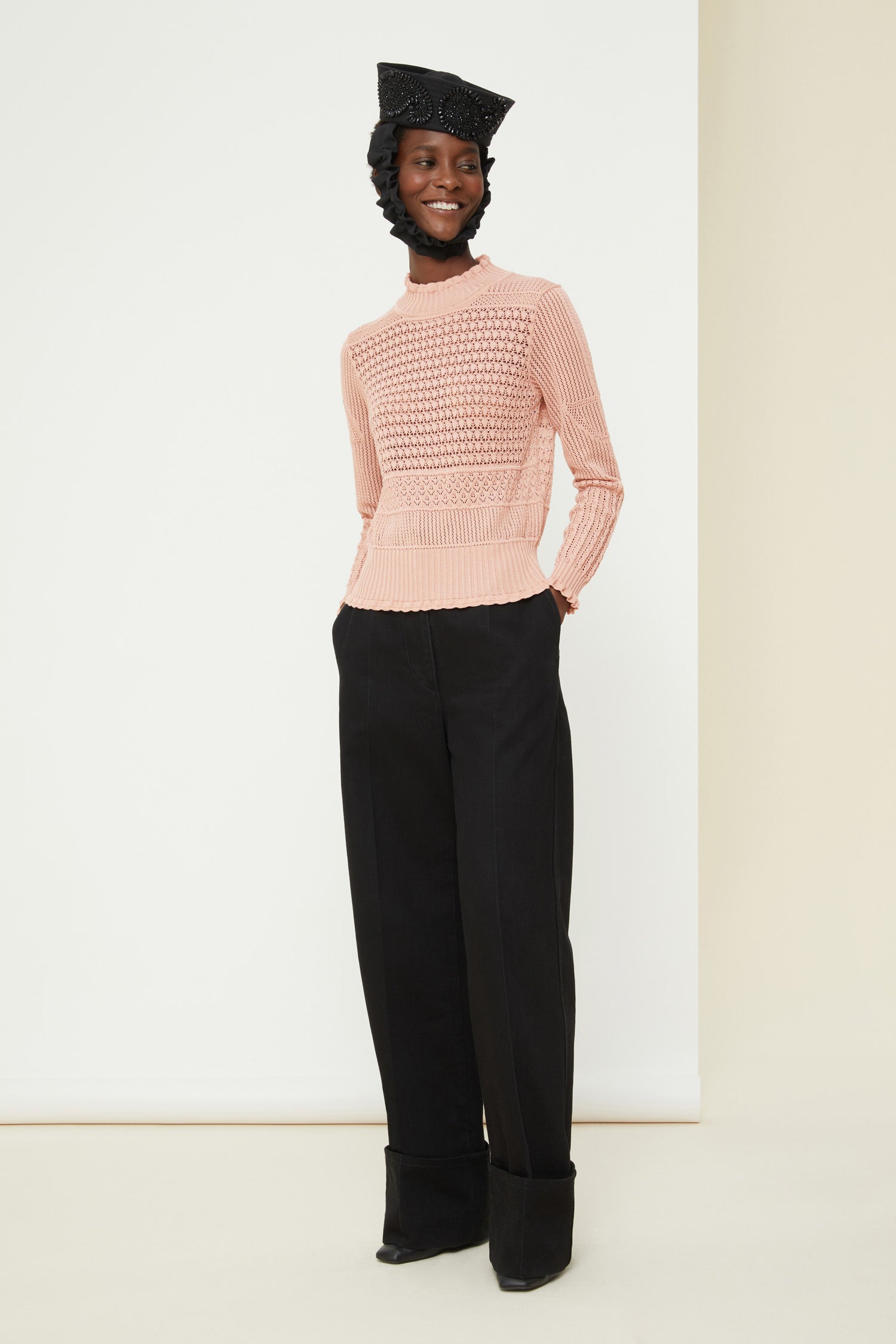 Patou - Cuffed wide-leg trousers in organic denim - Black - Cuffed and loose: denim elevated by Patou. Black organic denim trousers. Wide-legged style. Button fastening with belt loops. Pockets at the sides. Signature curved seam at the back. Wide cuffs.
