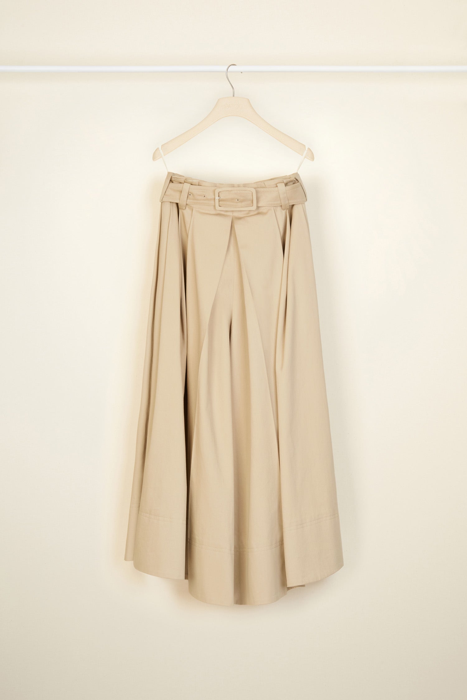 Patou - Cotton gabardine culottes in organic cotton - Sand - The effortless ease of a sensational silhouette: a Patou how-to.Sand beige cotton gabardine culottes. Oversized silhouette. Can be worn cinched at the waist or lower at the hips. Side pockets.