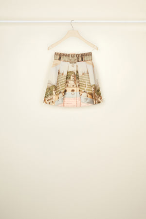 Belted pleated mini skirt in printed organic cotton and wool