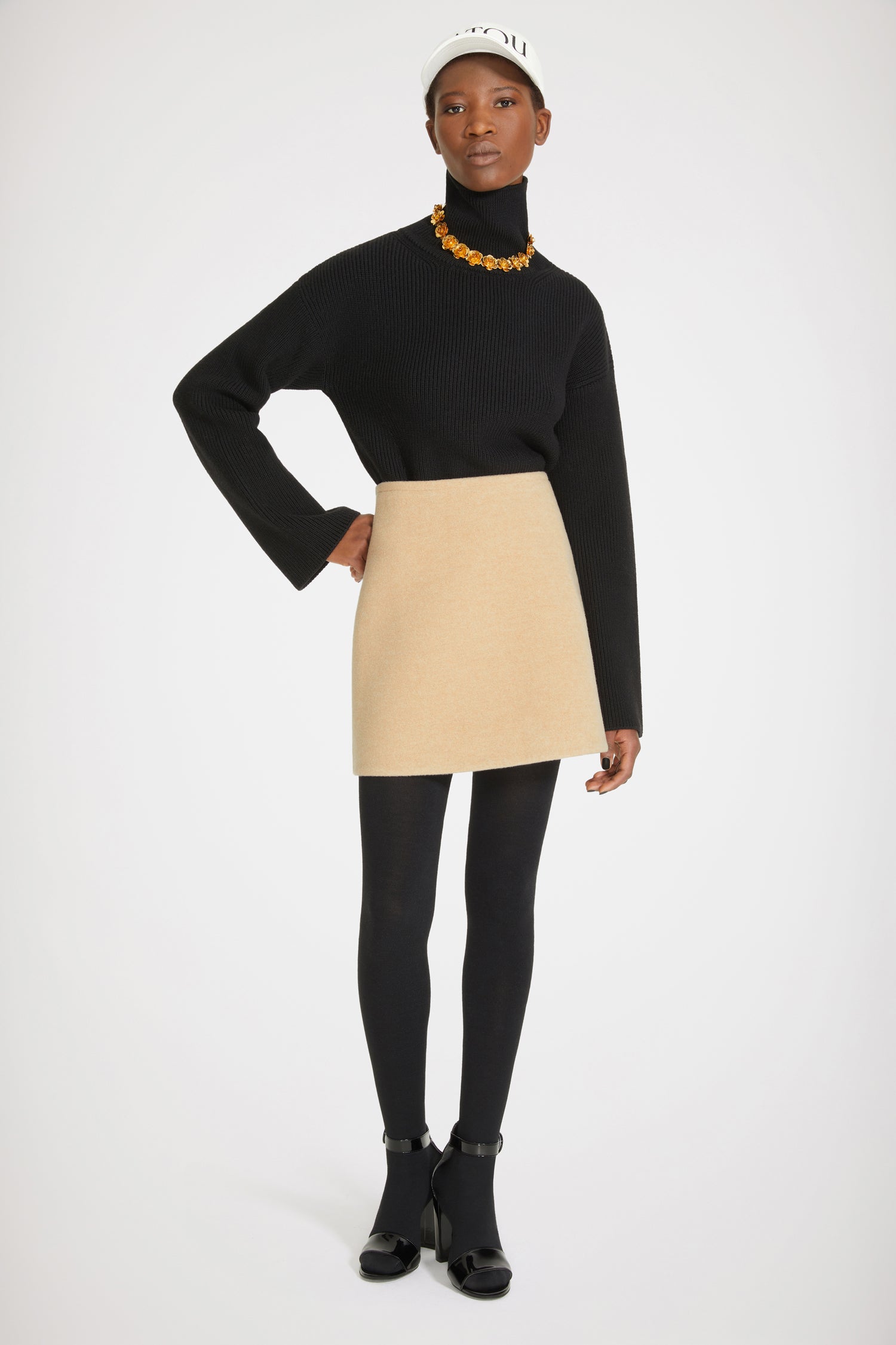 Patou - Mini skirt in double-faced wool - Biscuit - Simple but never dull: Patou for the everyday.Biscuit beige double-faced wool skirt. Short hemline. Zip fastening at the back.
