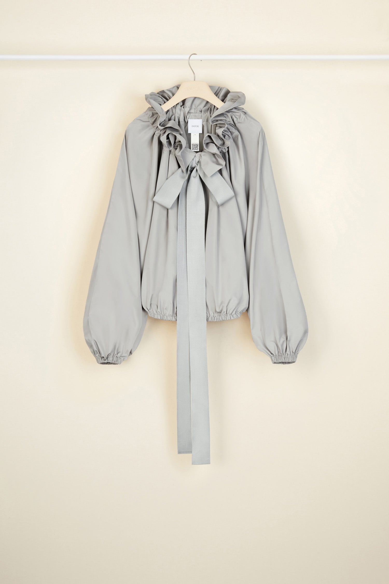Patou - Grosgrain puff sleeve top in recycled faille - Grey - An everyday proposition of bold sleeves and couture ribbons.Grey recycled polyester faille top. High volume silhouette. Drawstring collar with ruching and grosgrain. Batwing sleeves with elasticated cuffs. Elasticated waist.