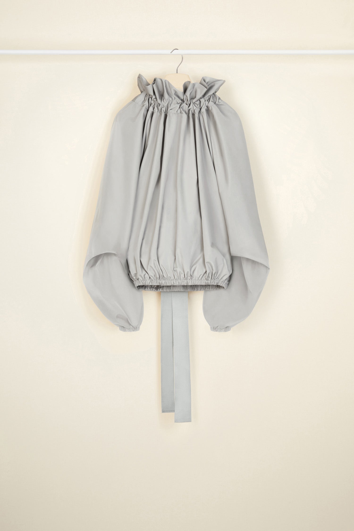 Patou - Grosgrain puff sleeve top in recycled faille - Grey - An everyday proposition of bold sleeves and couture ribbons.Grey recycled polyester faille top. High volume silhouette. Drawstring collar with ruching and grosgrain. Batwing sleeves with elasticated cuffs. Elasticated waist.