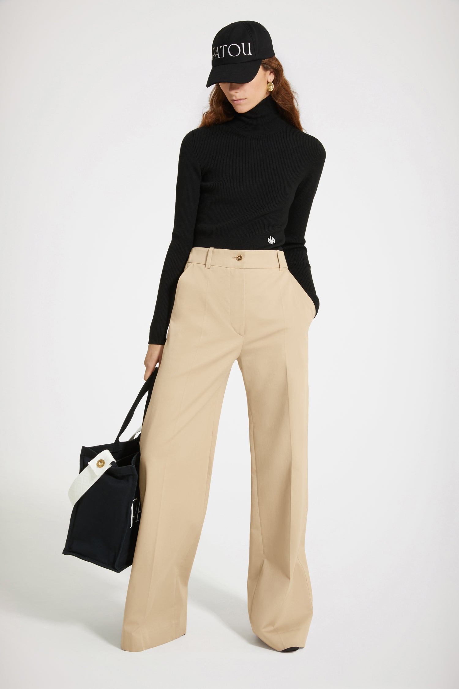 Patou - Iconic gabardine trousers in organic cotton - Sand - Flawless tailoring with a smile: a life in Patou.Patou’s iconic tailored trousers crafted from Sand beige cotton gabardine. Straight fit. Fastens via a gold-coloured JP-engraved button and zip at the front. Belt loops, two pockets at the sides. Signature darts at the back.