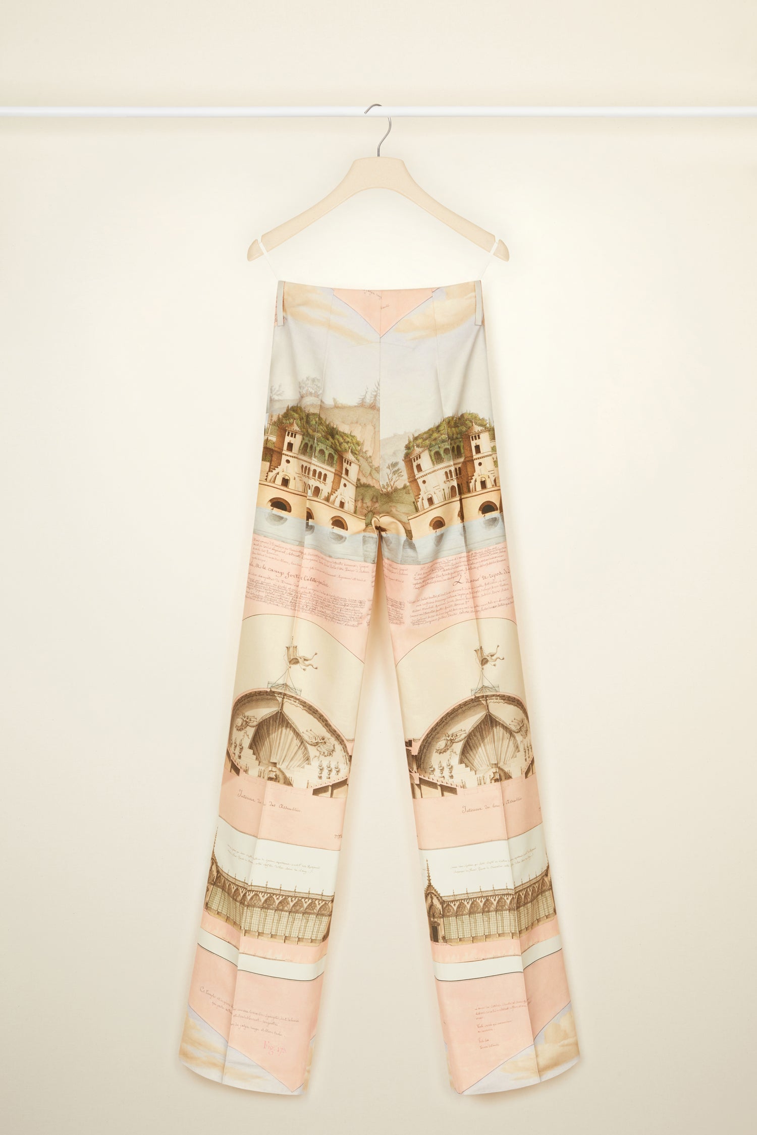 Patou - Long tailored trousers in printed organic cotton and wool - Amour Island - Flawless and carefree: tailoring by Patou.  Organic cotton and wool canvas trousers featuring Jean-Jacques Lequeu's “Amour Island” print. Long straight leg. Fastens via a single JP-engraved button and zip at the front. Belt loops. Pockets at the sides. Signature curved seam and darts at the back.
