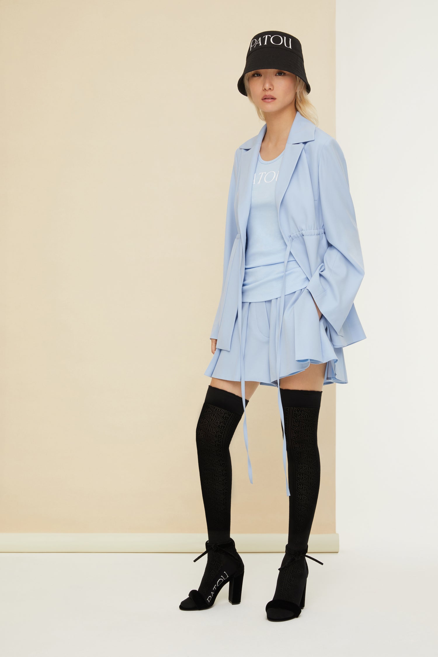 Patou - Belted pleated wool shorts - Sky Blue - Patou’s shortcut to chic. Sky Blue stretch virgin wool shorts. Adjustable belt at the waist with fabric-covered buckle. Patou lettering logo embroidered on the waistband. Belt loops. Wide pleats. Button fastening at the front. Pockets at the sides.