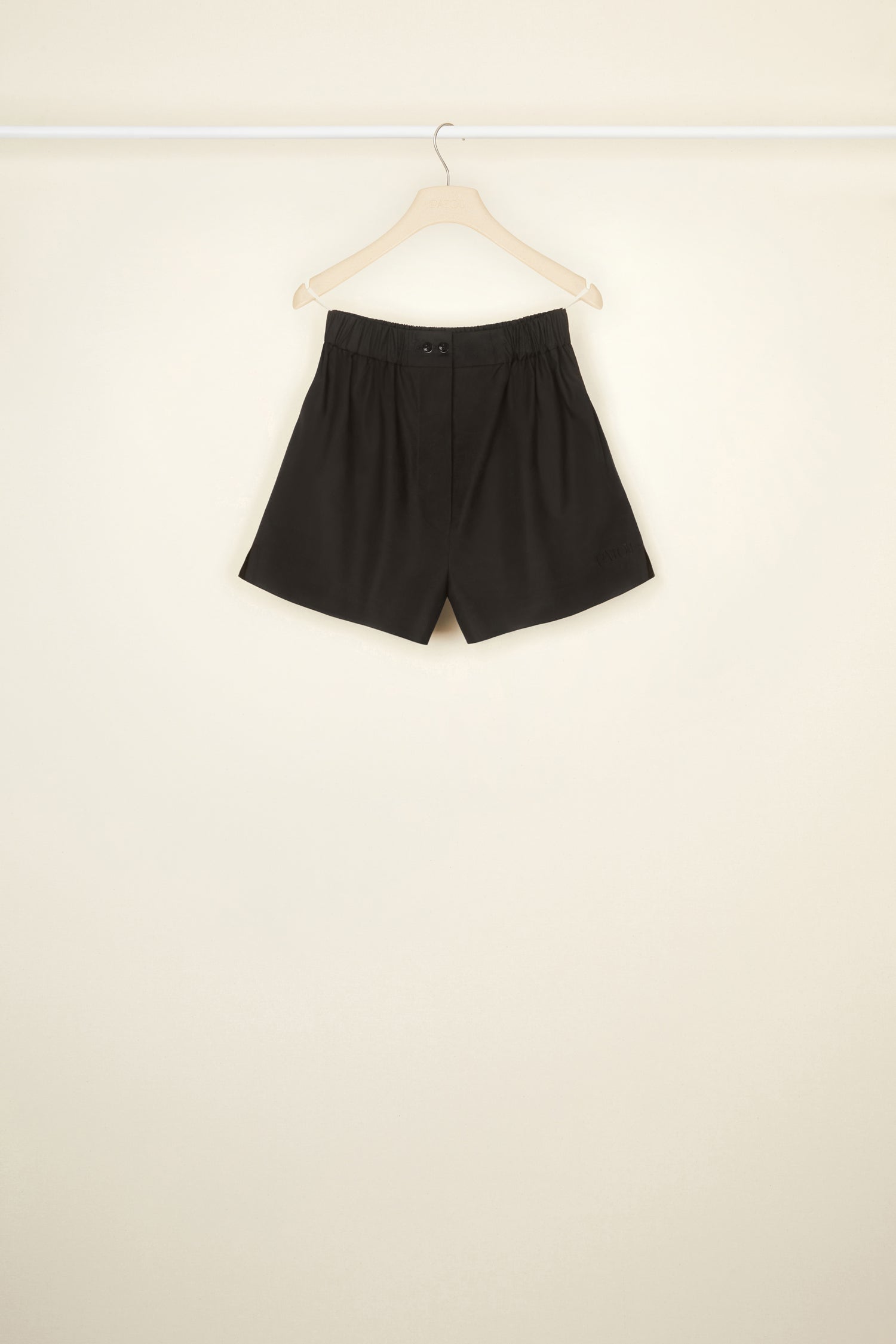Patou - Boxer shorts in organic cotton - Black - The boxer just got a whole lot chicer. Black organic cotton shorts. Boxer-style silhouette. Elasticated waist with two JP-engraved buttons. Pockets at the sides.