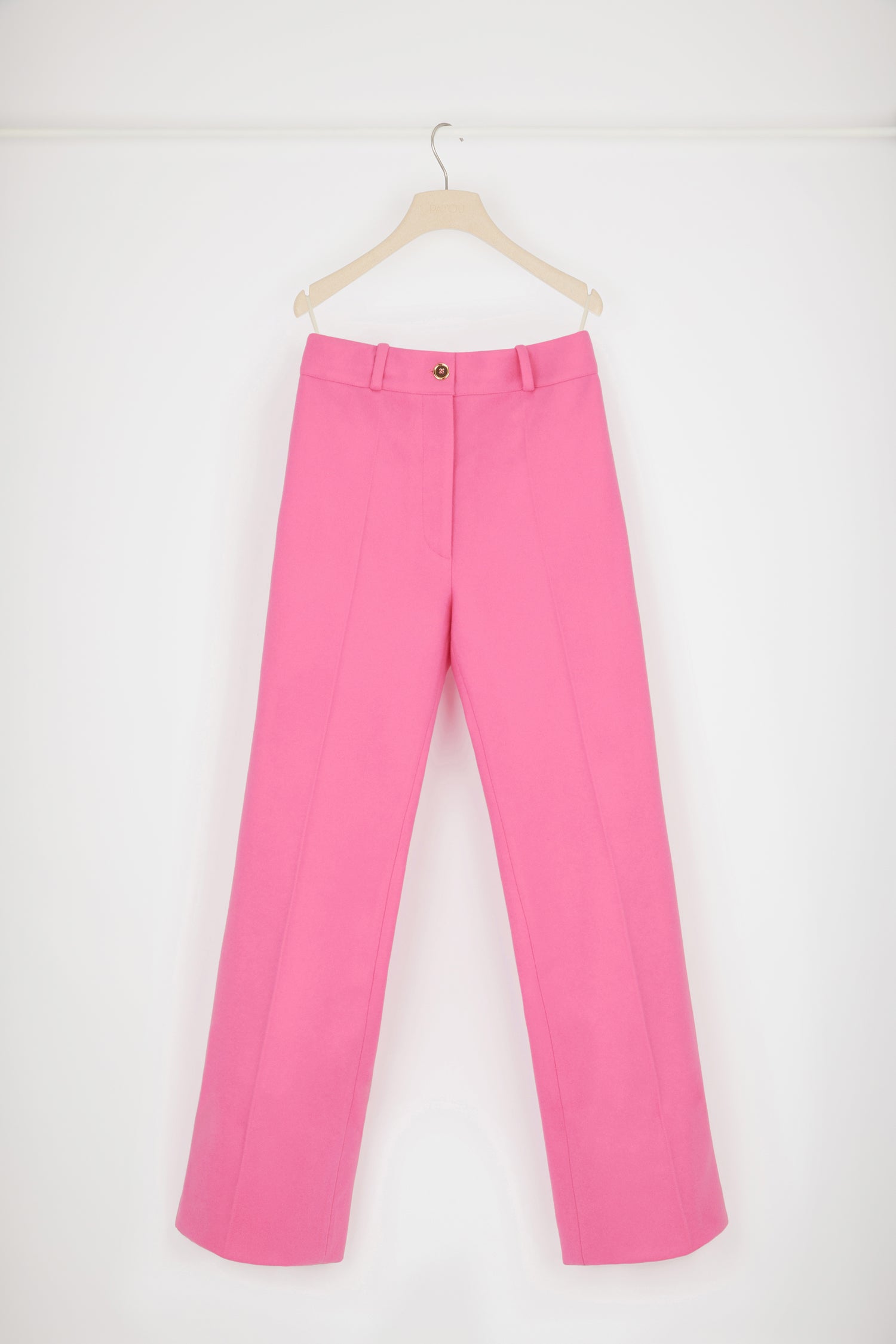 Patou - Flared trousers in responsible wool and cashmere - Darling Pink - Responsible wool, a touch of cashmere and a hint of fantasy: dream trousers by Patou.Darling Pink responsible virgin wool and cashmere trousers. Slightly flared straight leg with crease at the front and back. Eiffel tower construction. Mid rise. Gold-tone Patou button fastening at the front. Belt loops. Pockets at the sides.