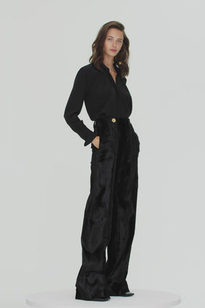 Wide legged faux ponyskin trousers