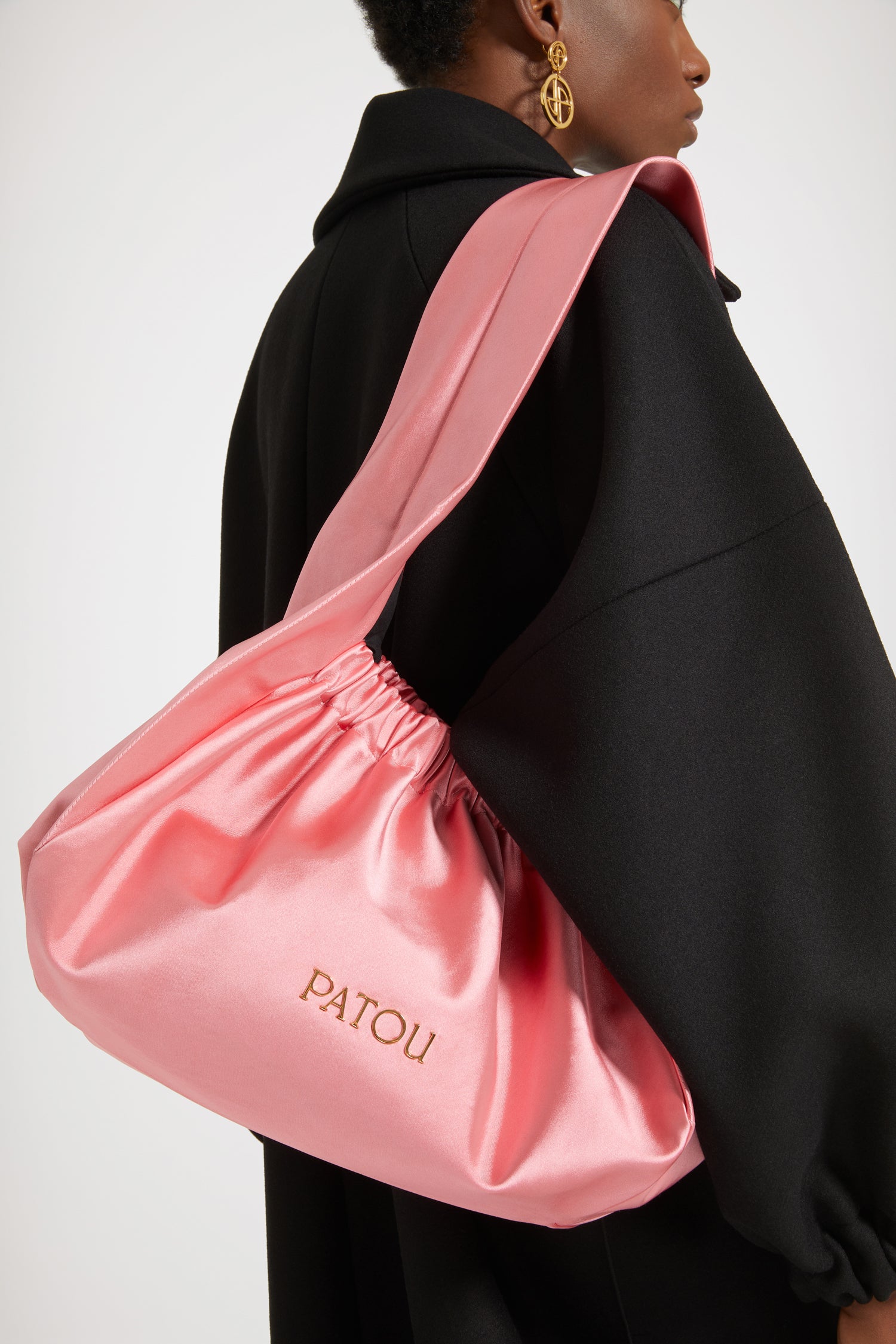 Patou - Le Biscuit large bag - Hot Pink - Origami à Paris!Hot Pink cotton-blend satin bag. Large version. Hobo shape with wide built-in strap. Elasticated opening. Gold-tone metal Patou logo. Cotton lining.