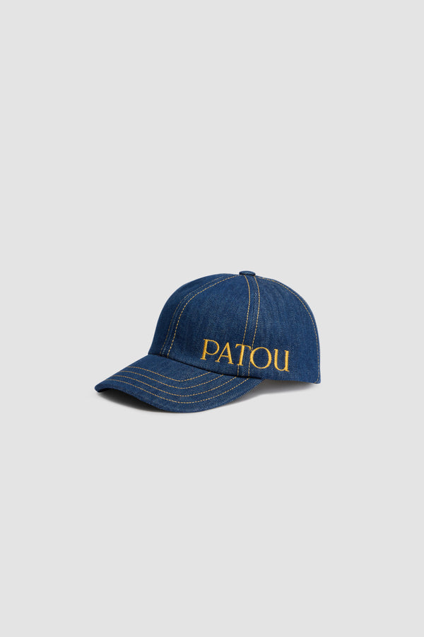 Patou - Patou cap in organic cotton denim - Rodeo Blue - Rodeo Blue organic cotton denim baseball hat. Patou logo embroidered at the side. Elasticated strap at the back. Unisex style.S: 55 cm circumferenceM: 57 cm circumferenceL: 59 cm circumference