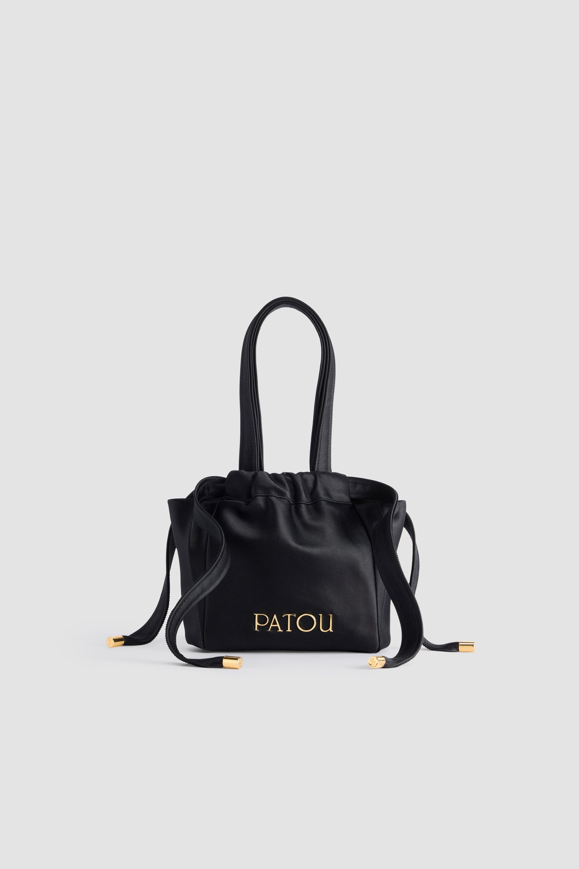 Patou - Evening pouch in recycled satin - Black - Black recycled satin pouch. Drawstring lace fastening. Top handles. Gold-tone metal Patou. Fully lined.